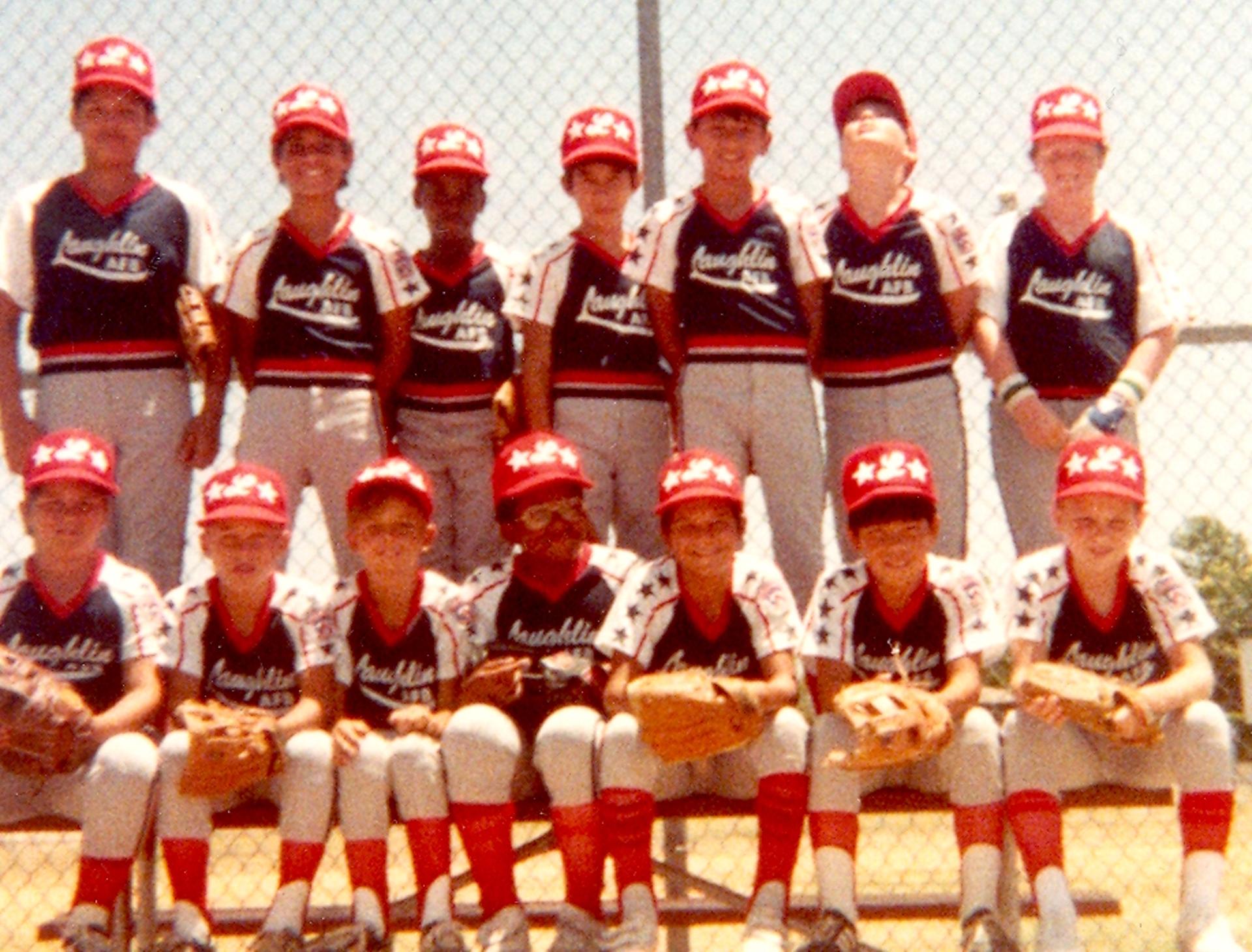 Young Troy, top row, second from right, checks out an Air Force plane flying overhead.