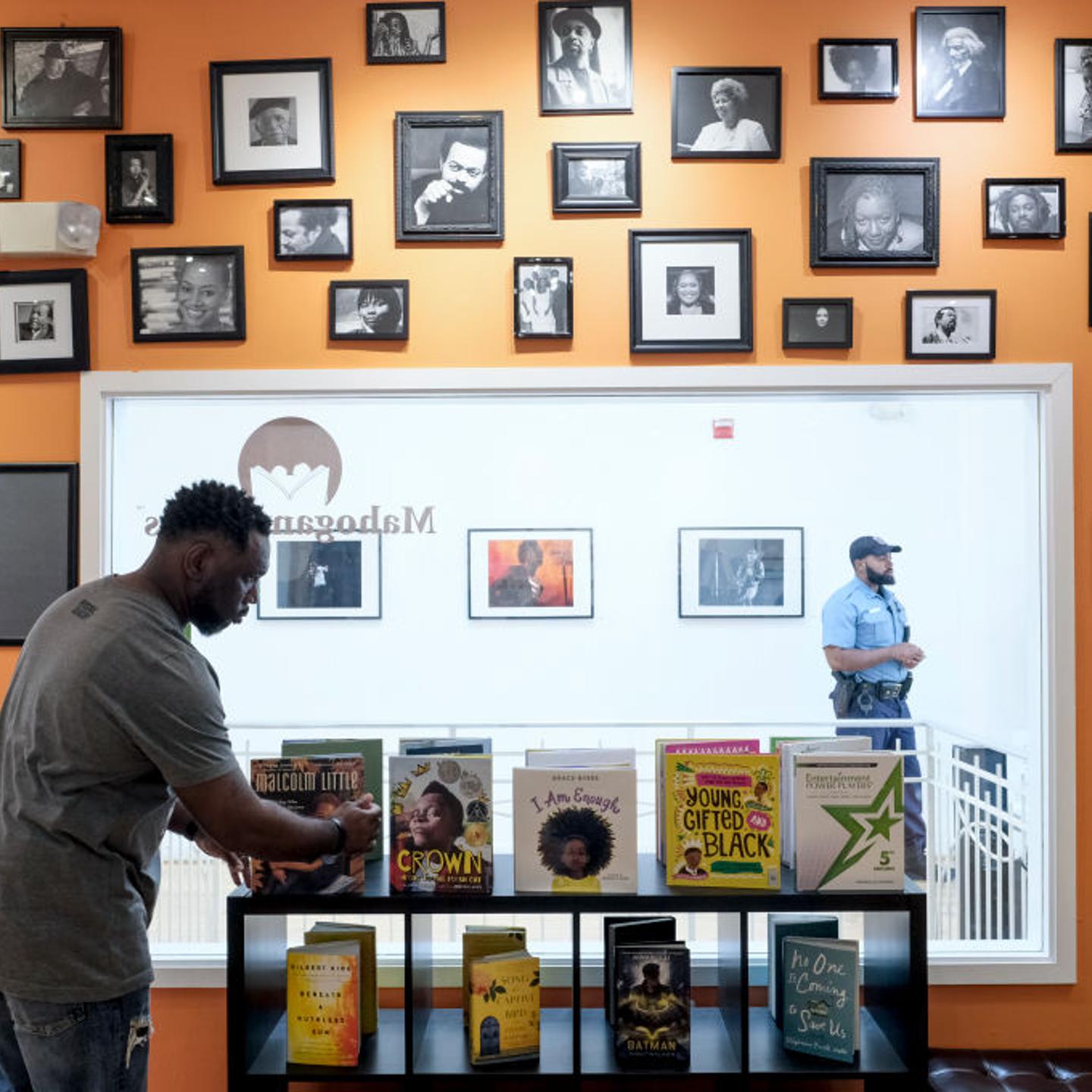 WASHINGTON, DC - APRIL 27: Derrick Young organizes books at Mah