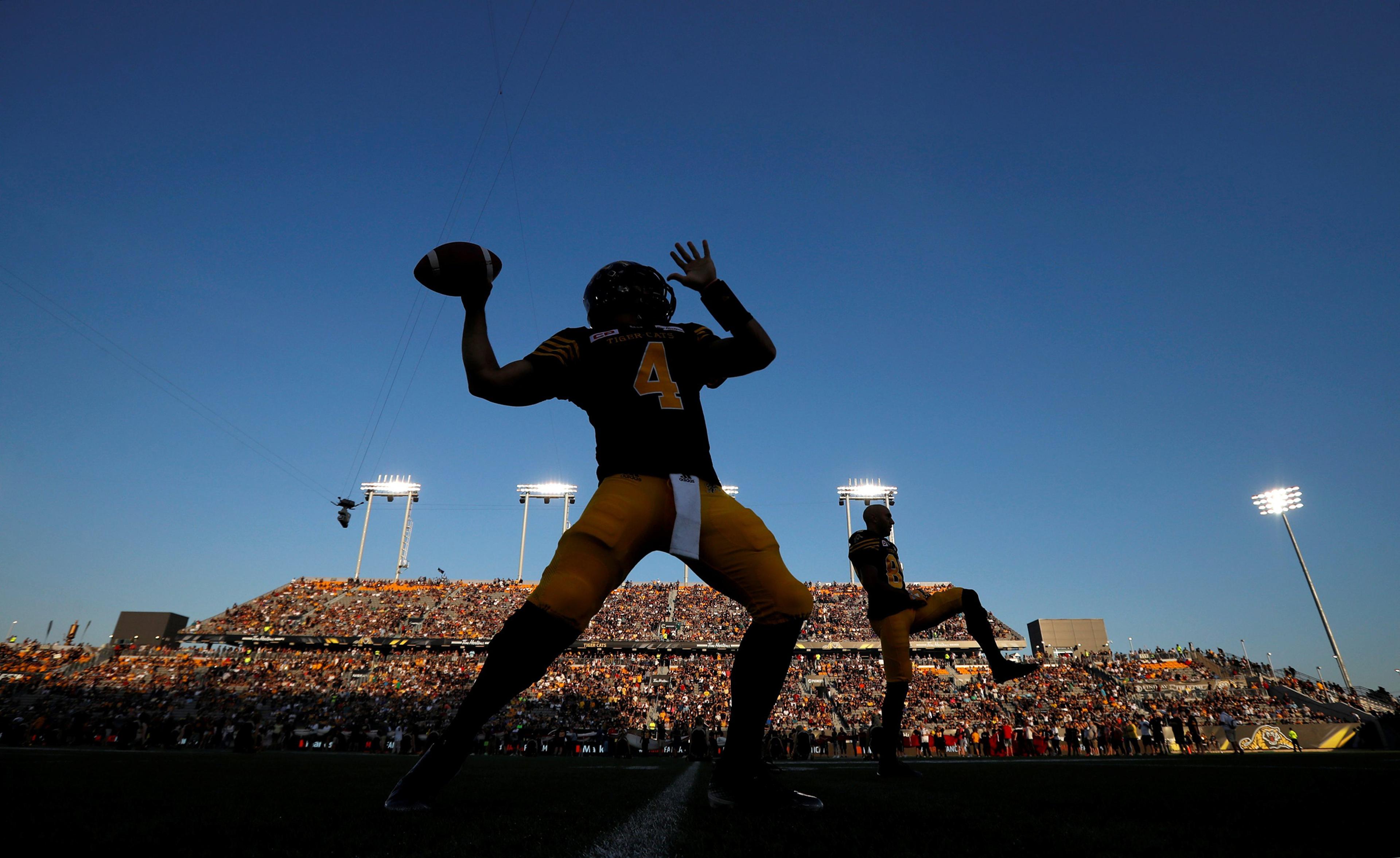 Hamilton Tiger-Cats' Zach Collaros warms up before his team plays the Toronto Argonauts in their CFL game in Hamilton, Sept. 5, 2016.