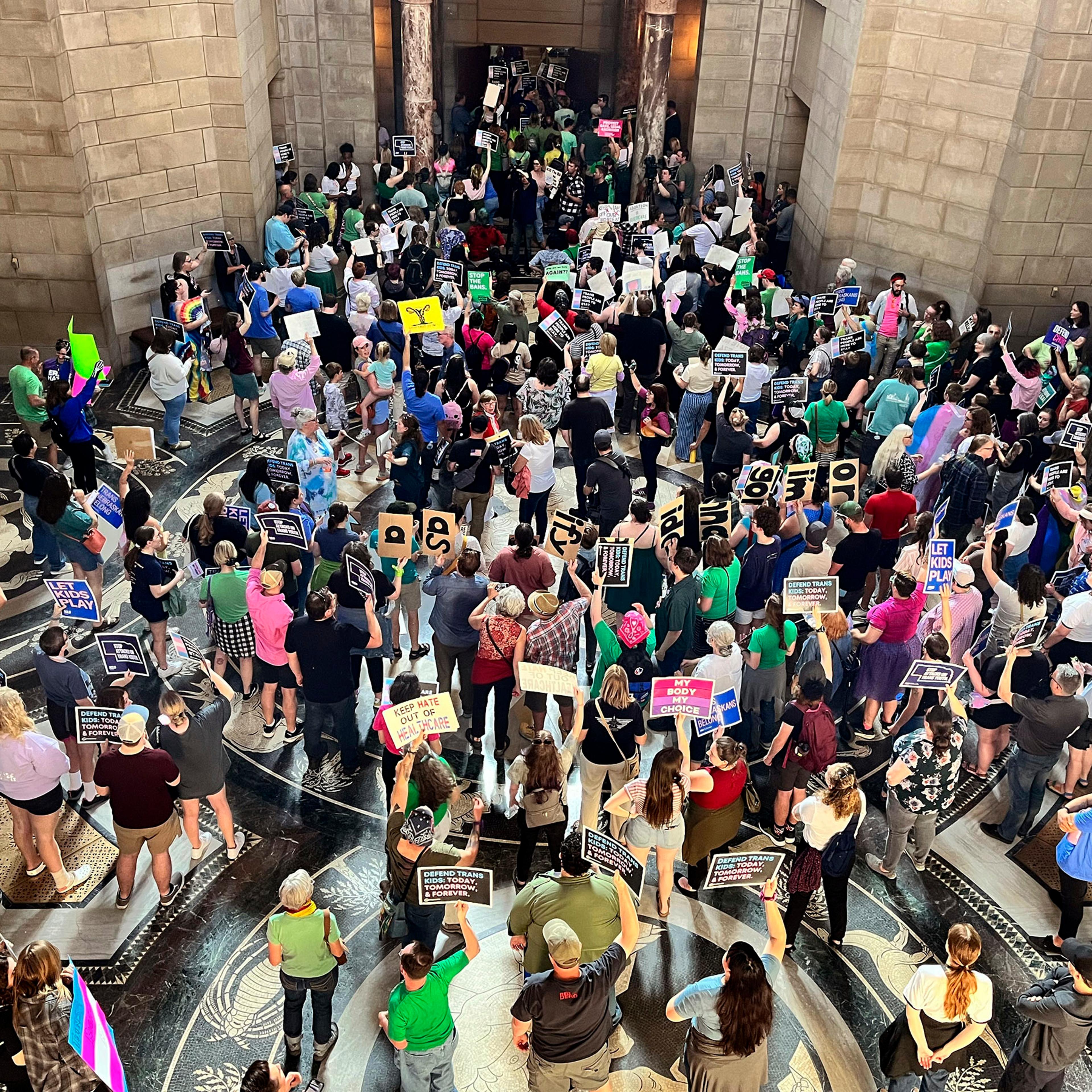 Hundreds of people gather at the Nebraska Capitol, in Lincoln, Neb., to protest plans by conservative lawmakers in the Nebraska Legislature to revive an abortion ban, on May 16, 2023.