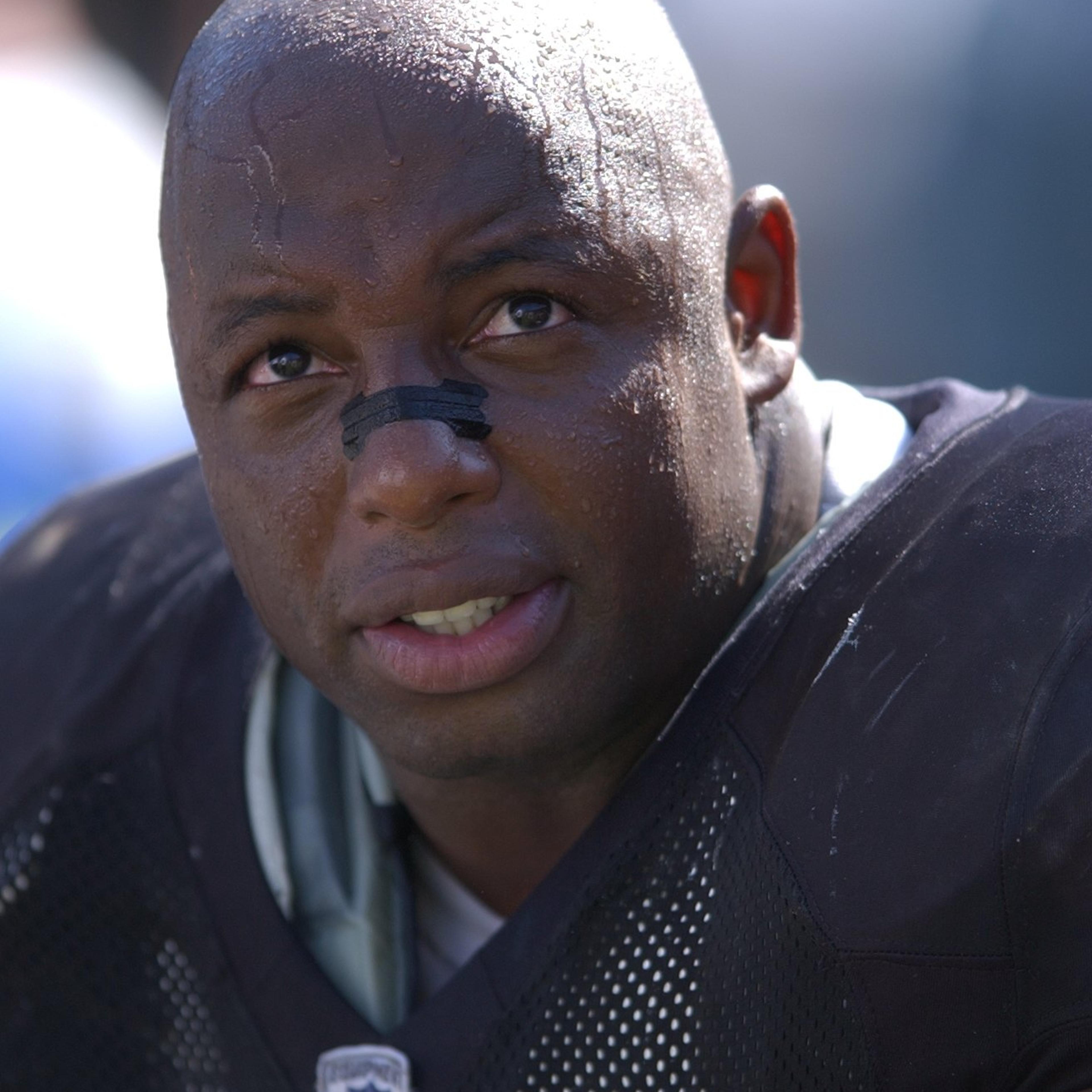 Dana Stubblefield #94 of the Oakland raiders rests on the bench during a game against the Cincinnati Bengals on September 14, 2003 at the Network Associates Coliseum in Oakland, California.