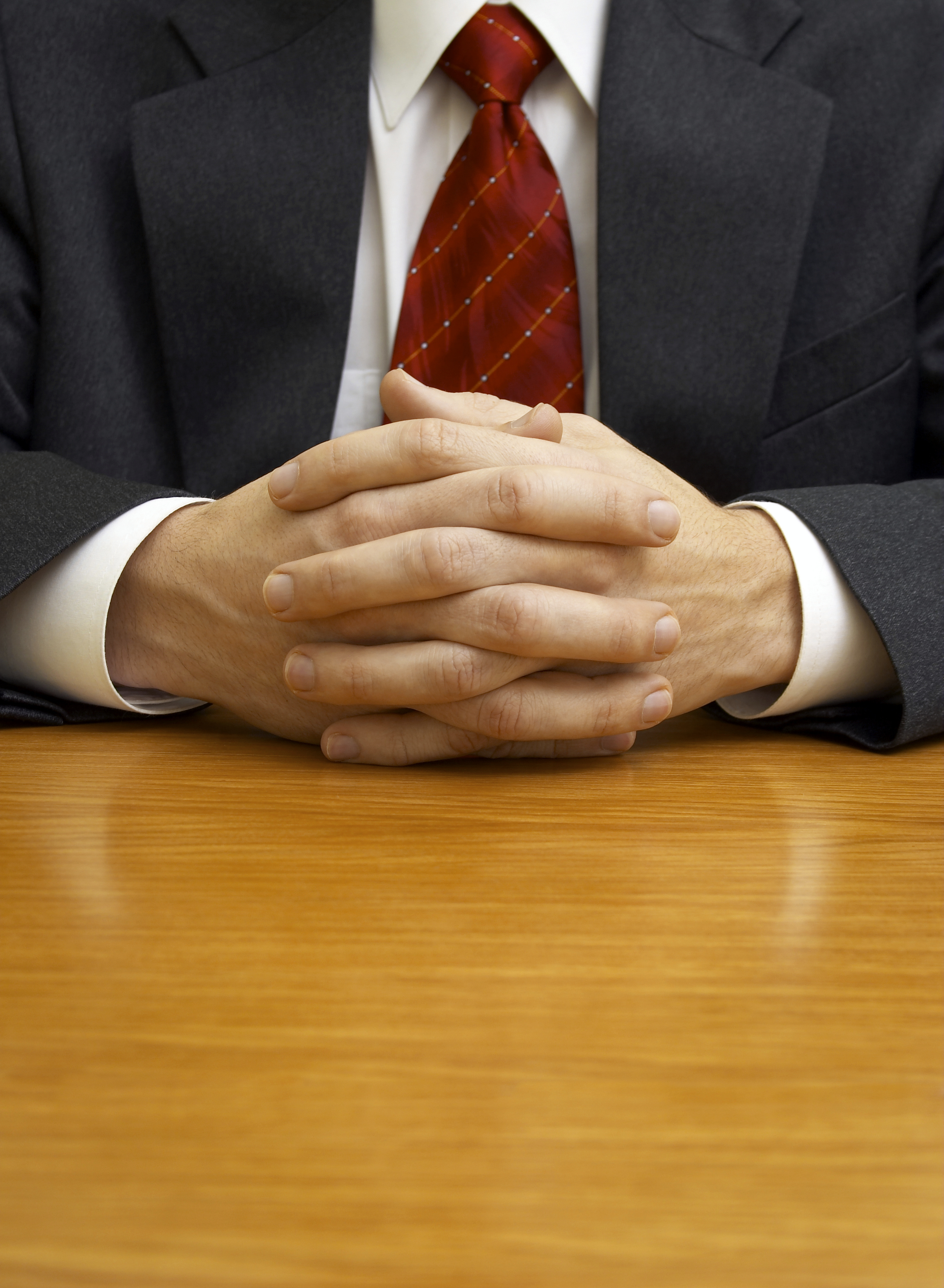 businessman-hands-desk