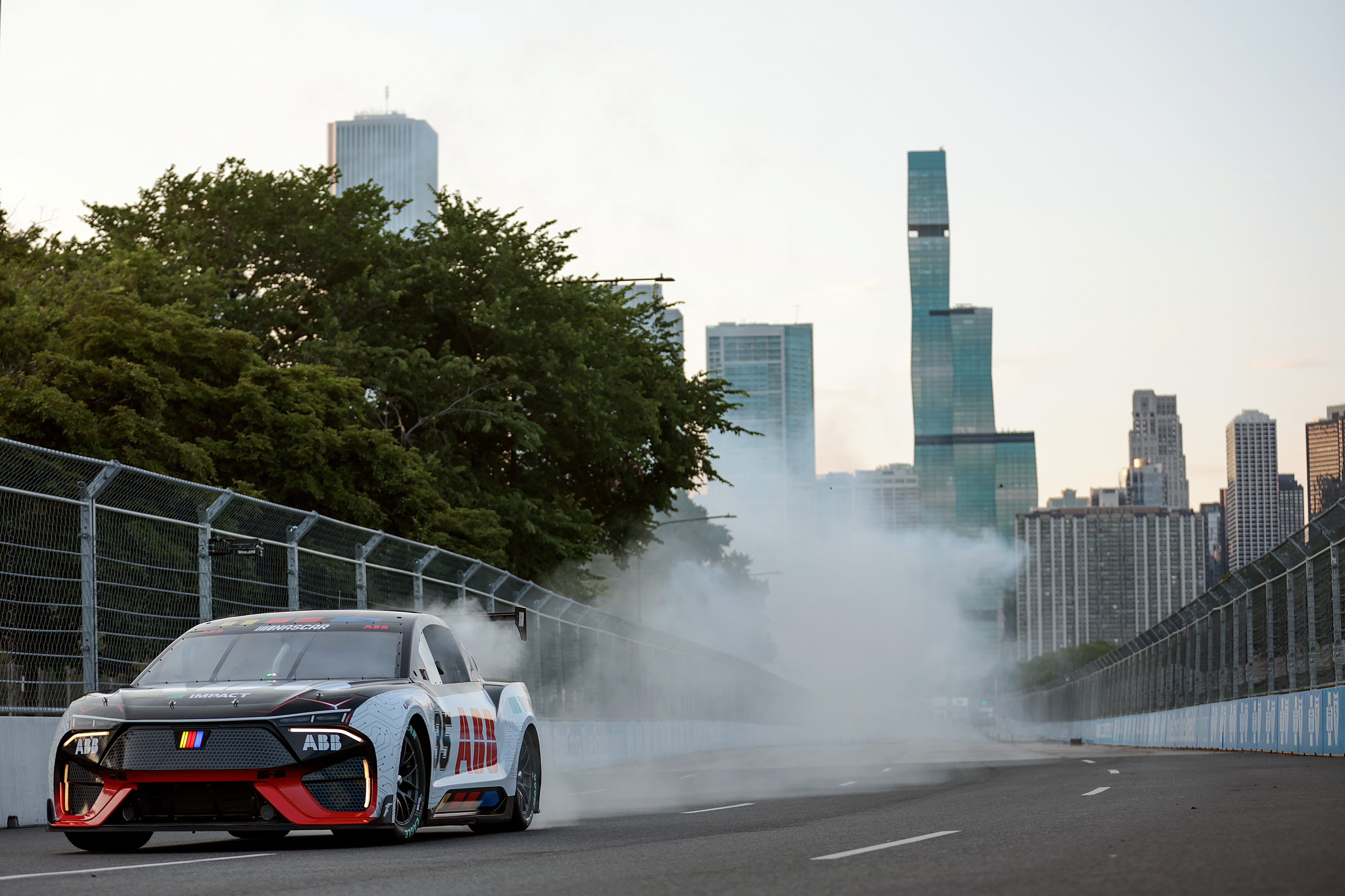 The ABB NASCAR new EV prototype performs a demonstration run on track at the Chicago Street Course on July 06, 2024 in Chicago, Illinois. 