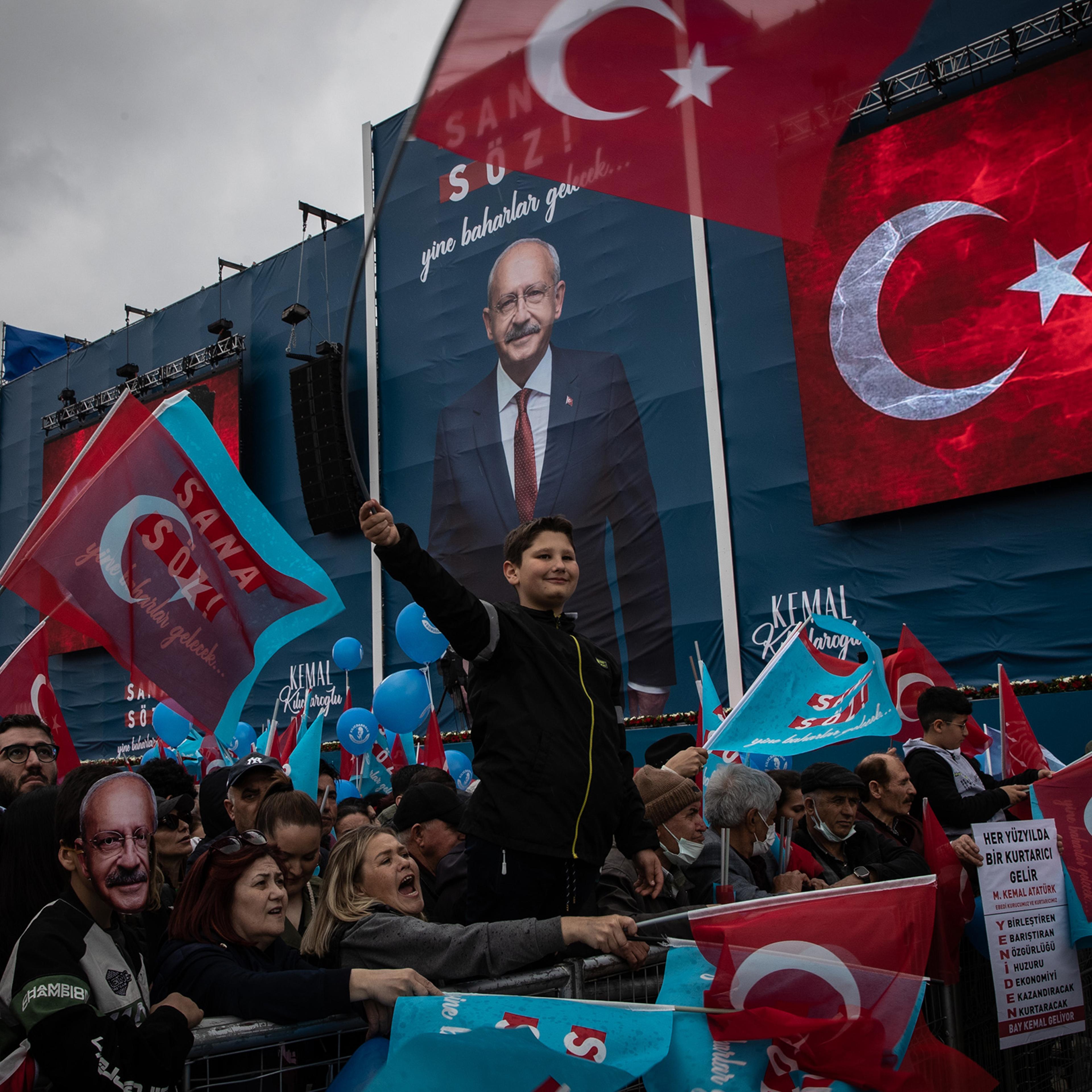 Supporters wave flags and chant slogans while waiting for the arrival of CHP Party presidential candidate Kemal Kılıçdaroğlu during a campaign rally on May 6 in Istanbul.