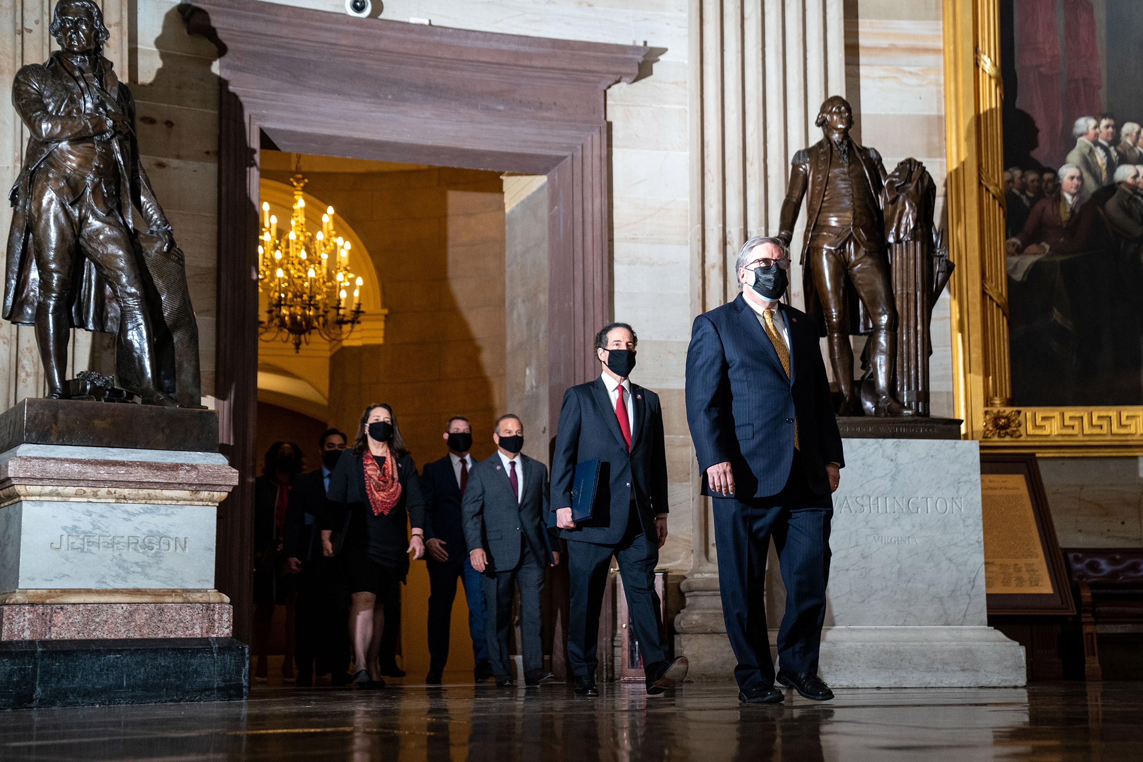 House impeachment managers, lead by Rep. Jamie Raskin, walk through the Rotunda of the U.S. Capitol in Washington on Feb. 9, 2021.