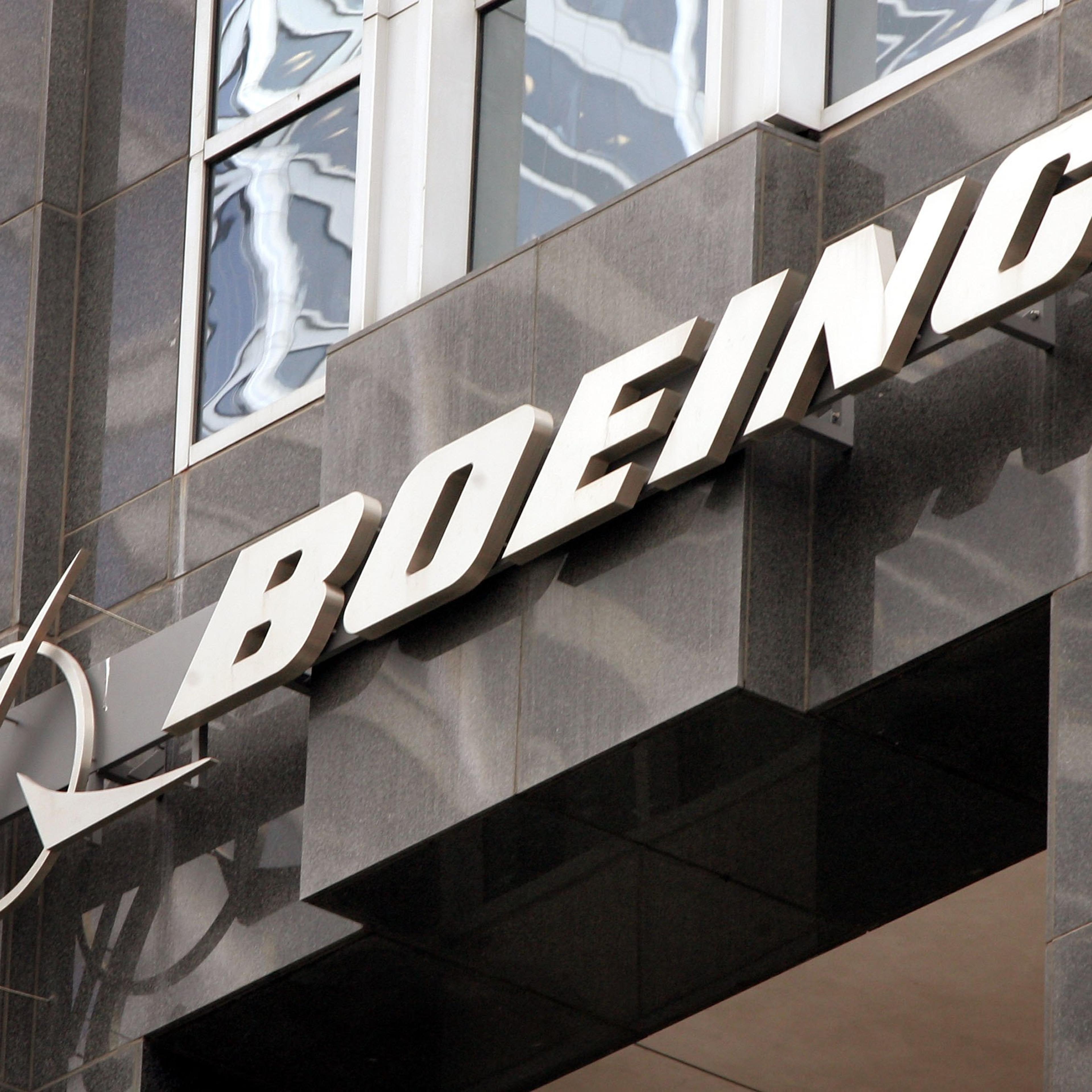 The Boeing logo hangs on the corporate world headquarters building of Boeing November 28, 2006 in Chicago, Illinois.