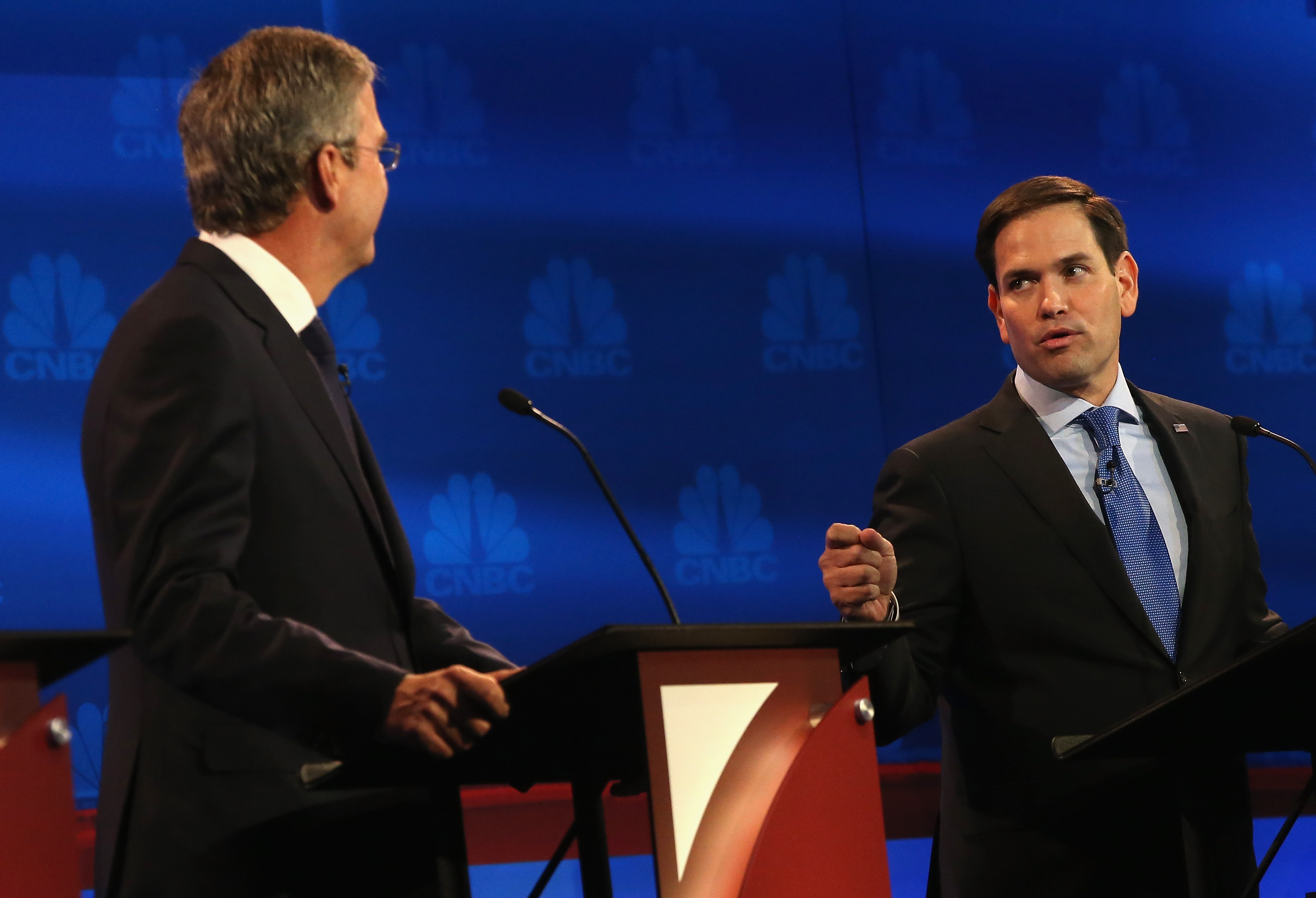 Presidential candidates Sen. Marco Rubio (R) (R-FL) speaks while Jeb Bush looks on during the CNBC Republican Presidential Debate in Boulder, Colorado on Oct. 28, 2015 .