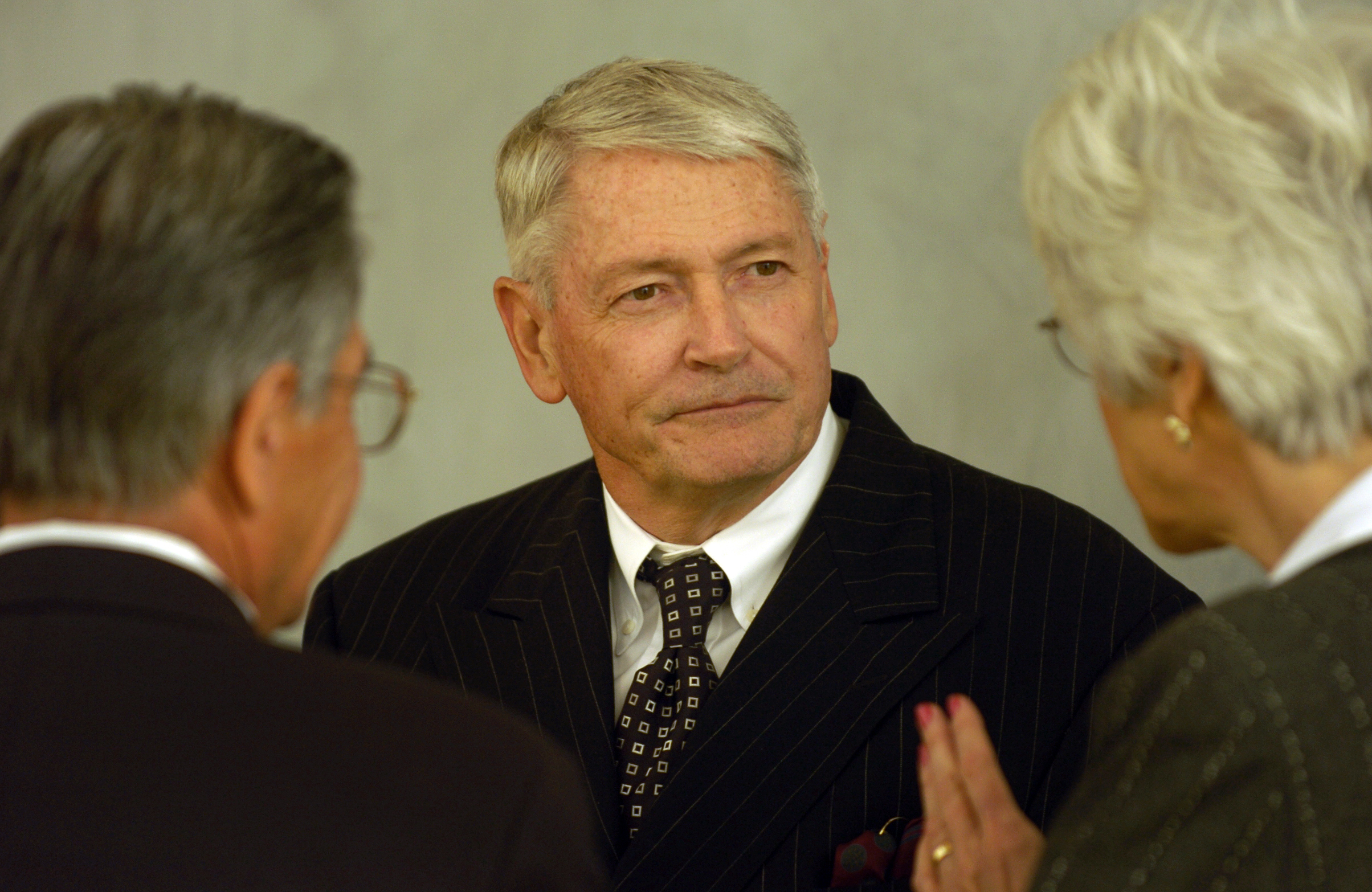 Liberty Media Chairman John Malone socialized Wednesday evening before the University of Colorado Business School Celebration of Success Dinner at the Hyatt Hotel on May 17, 2006.