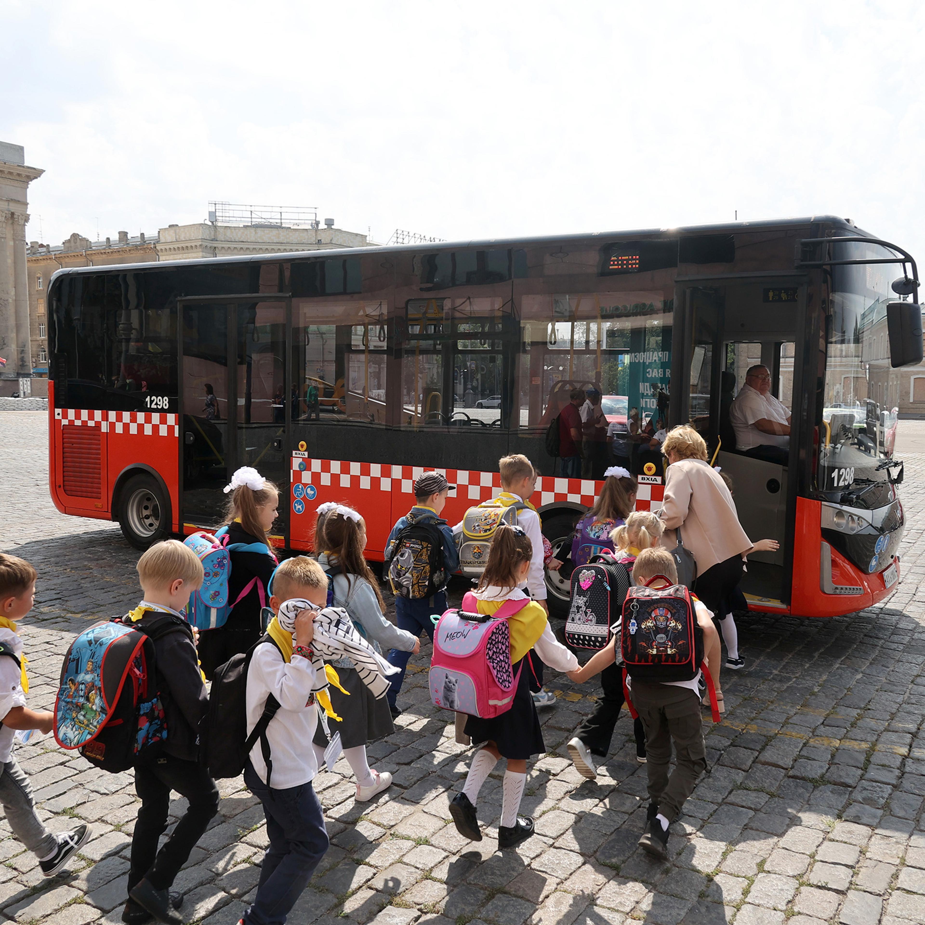 Ukraine School children board bus