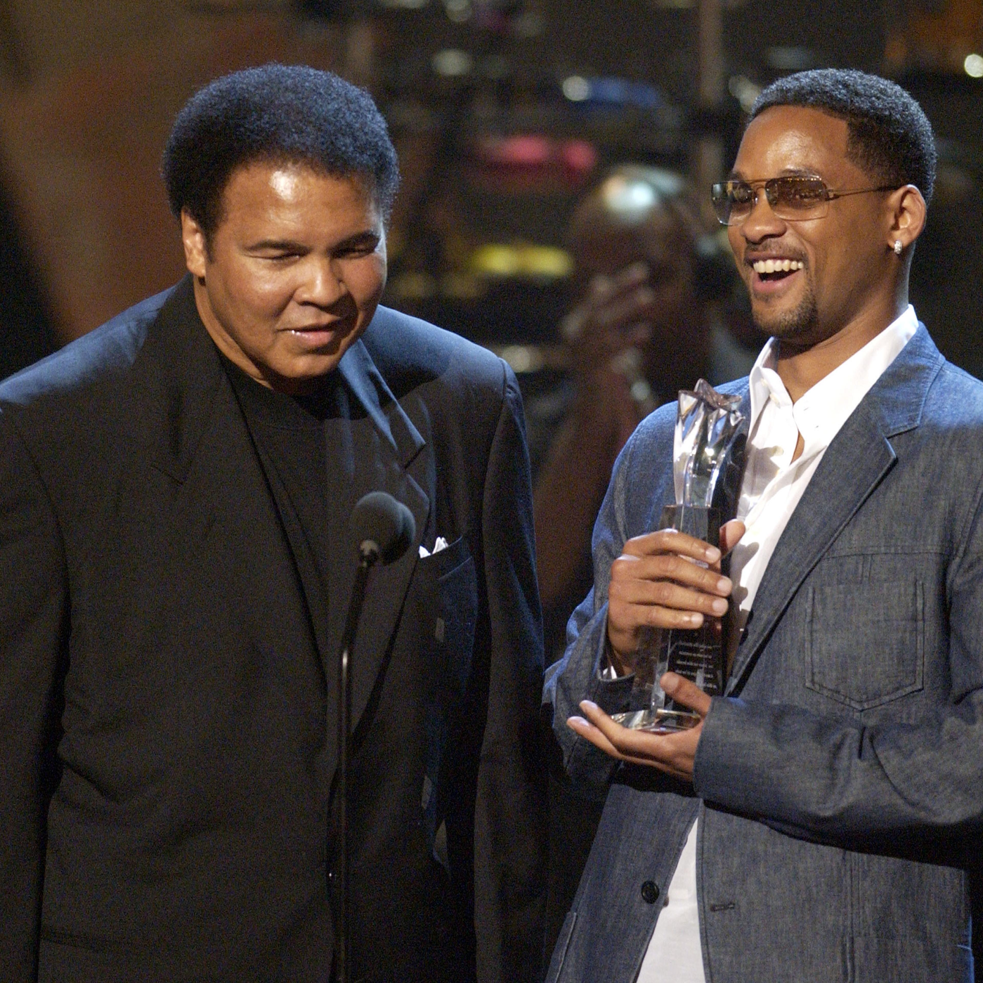 Muhammad Ali accepting his Humanitarian Award from presenter Will Smith during the 2nd annual BET Awards in Los Angeles on June 25, 2002.
