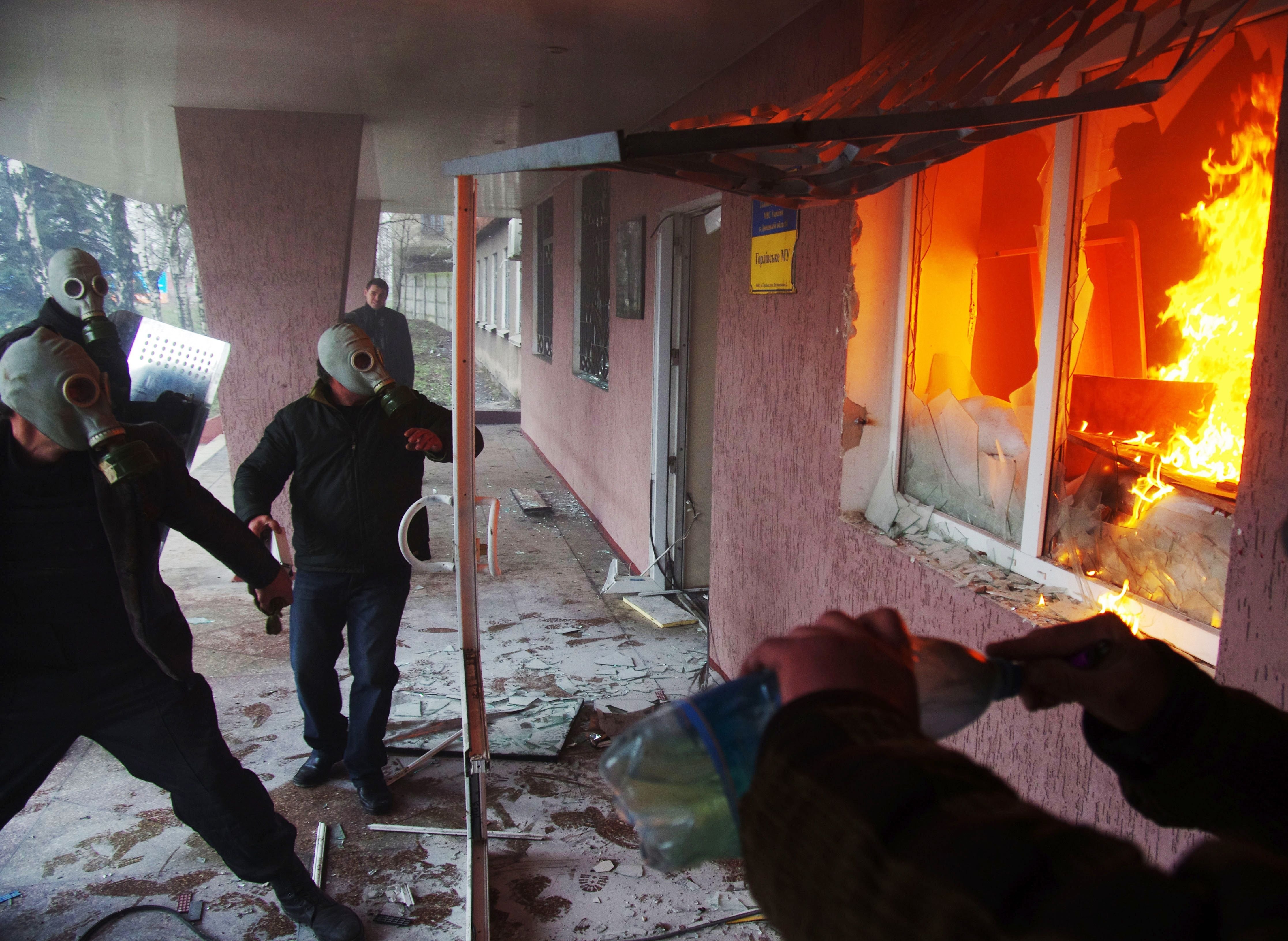 Rising tension Pro-Russian protesters storm a regional police building in the eastern Ukrainian city of Horlivka