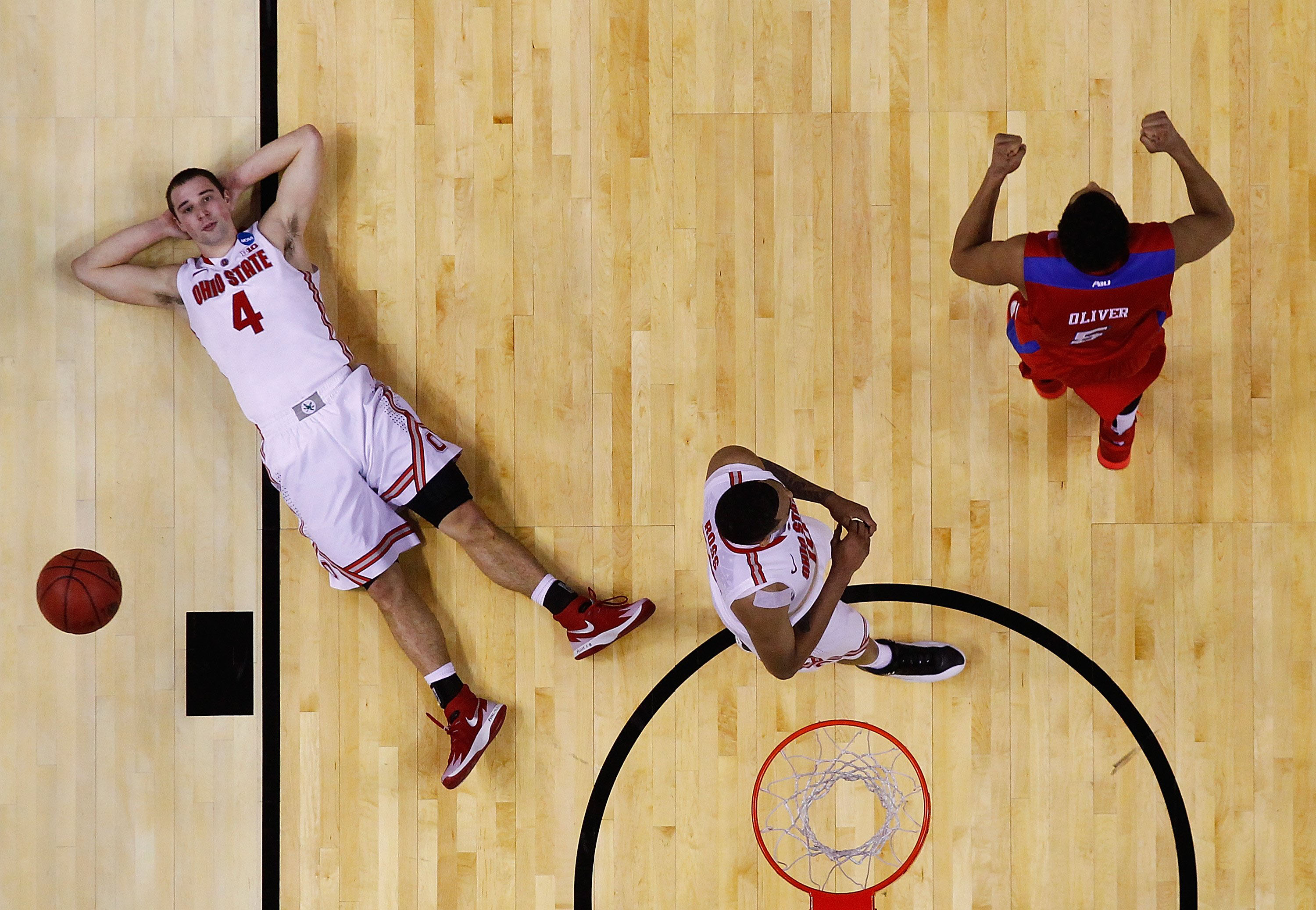 Aaron Craft of the Ohio State Buckeyes reacts after losing to the Dayton Flyers 60-59 in the second round of the 2014 NCAA Men's Basketball Tournament at the First Niagara Center on March 20, 2014 in Buffalo, N.Y.