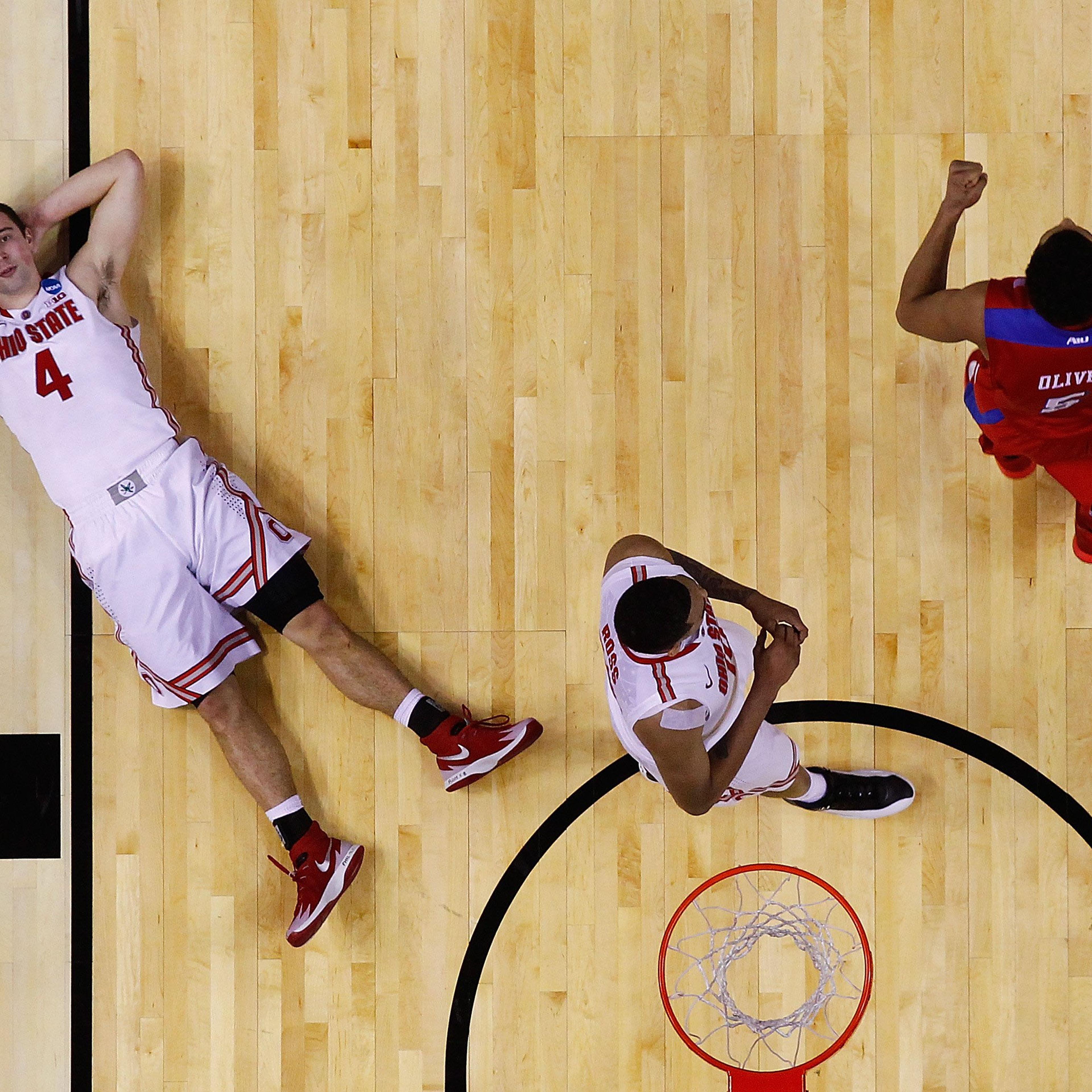 Aaron Craft of the Ohio State Buckeyes reacts after losing to the Dayton Flyers 60-59 in the second round of the 2014 NCAA Men's Basketball Tournament at the First Niagara Center on March 20, 2014 in Buffalo, N.Y.