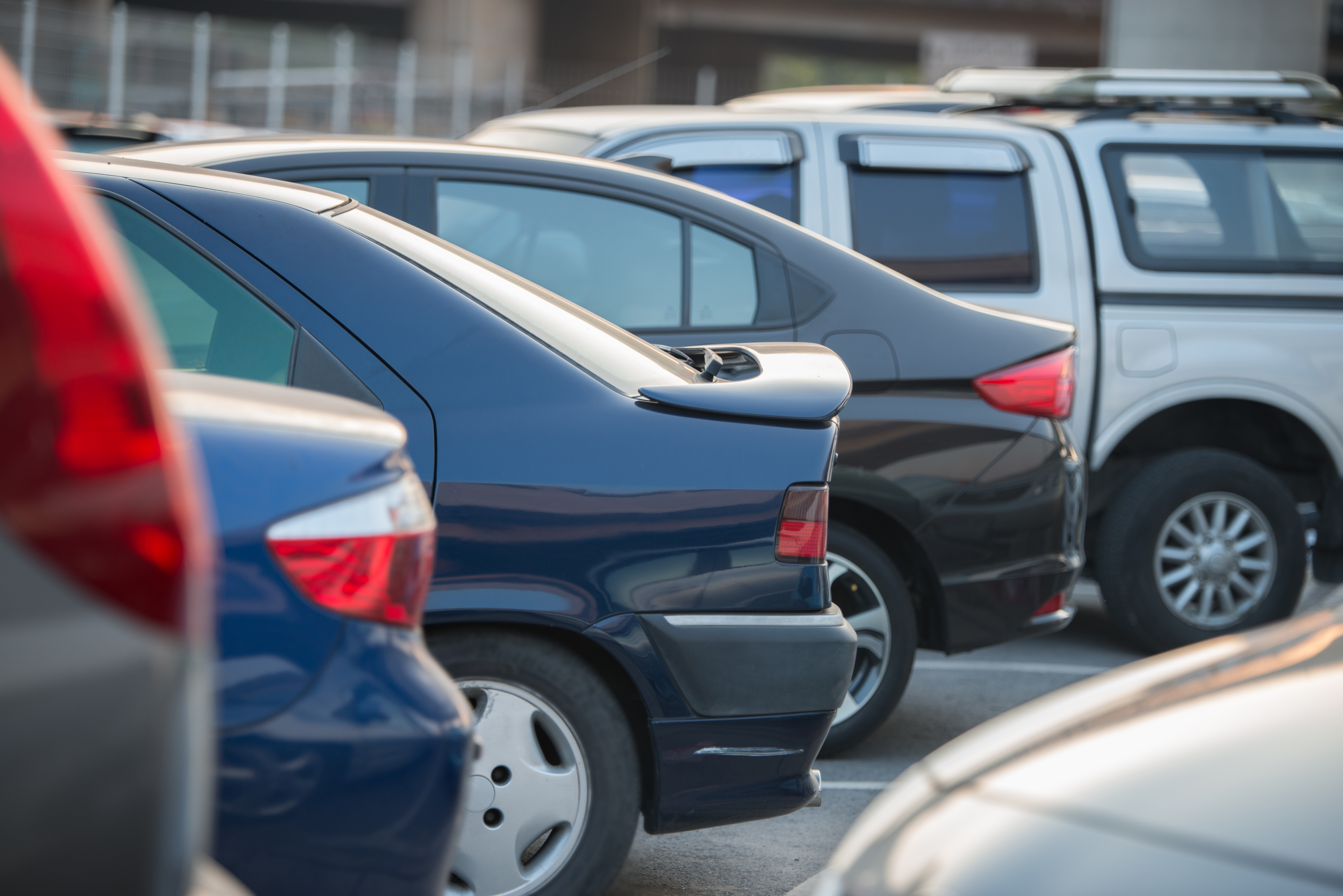 cars in a row on a parking lot