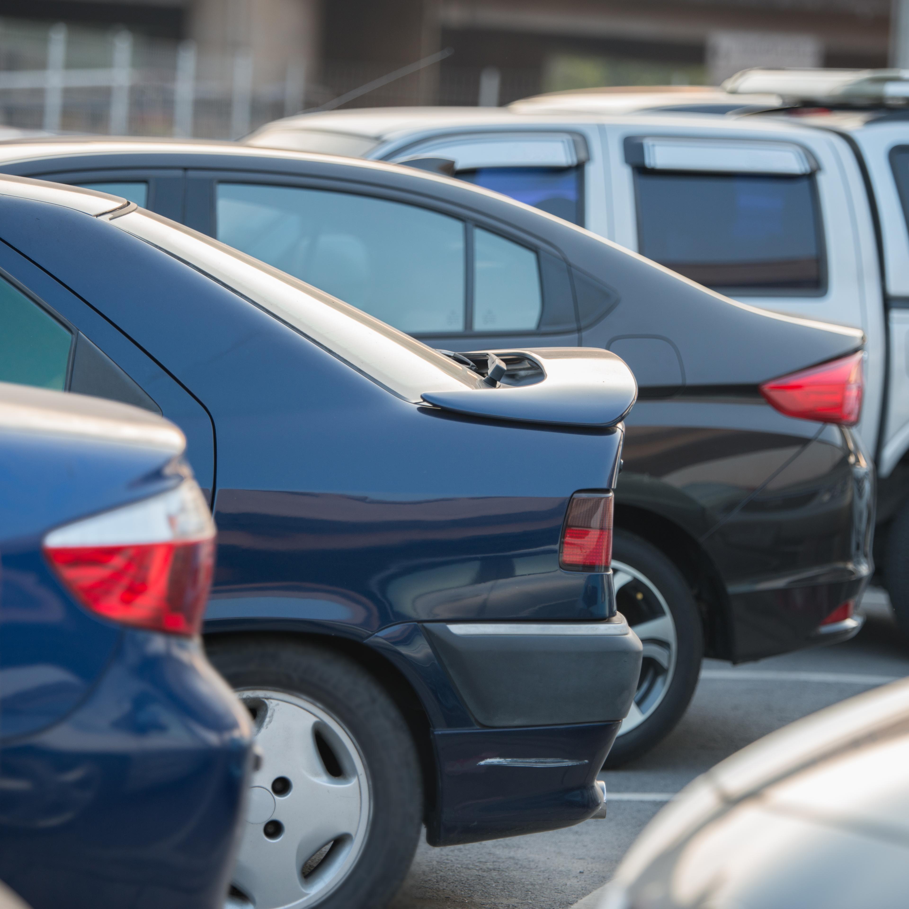 cars in a row on a parking lot