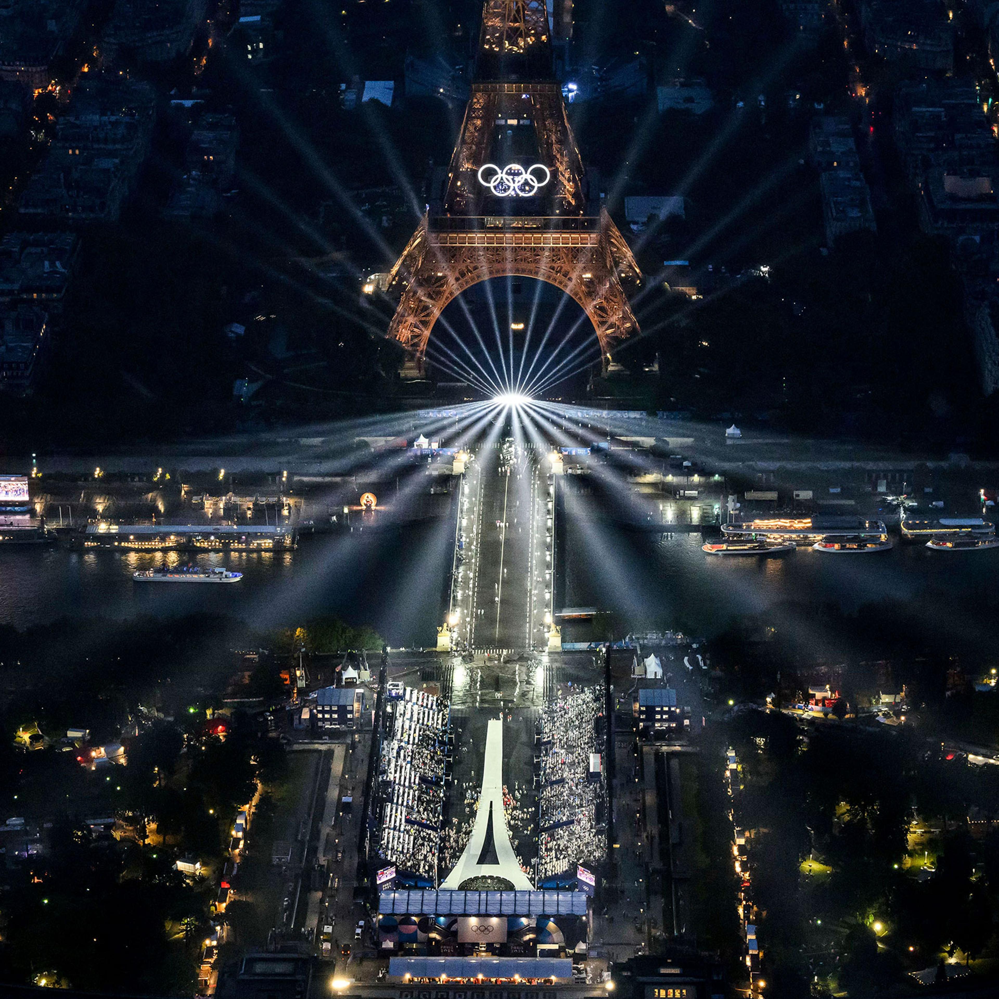 The Eiffel Tower and the Olympics rings are lit up during the opening ceremony for the 2024 Summer Olympics in Paris, France, on July 26, 2024.