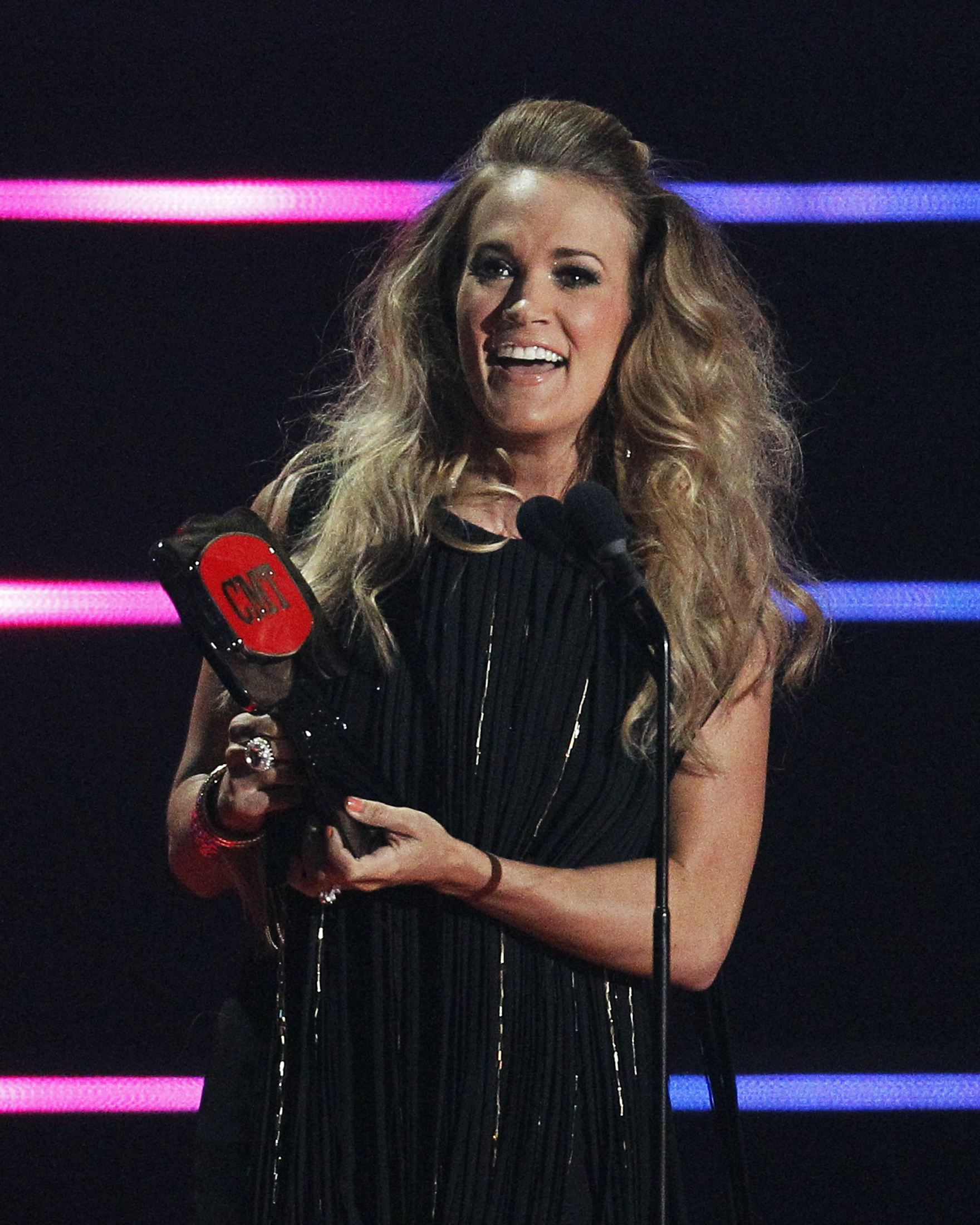 Carrie Underwood accepts Video Of The Year Award during the 2014 CMT Music Awards in Nashville