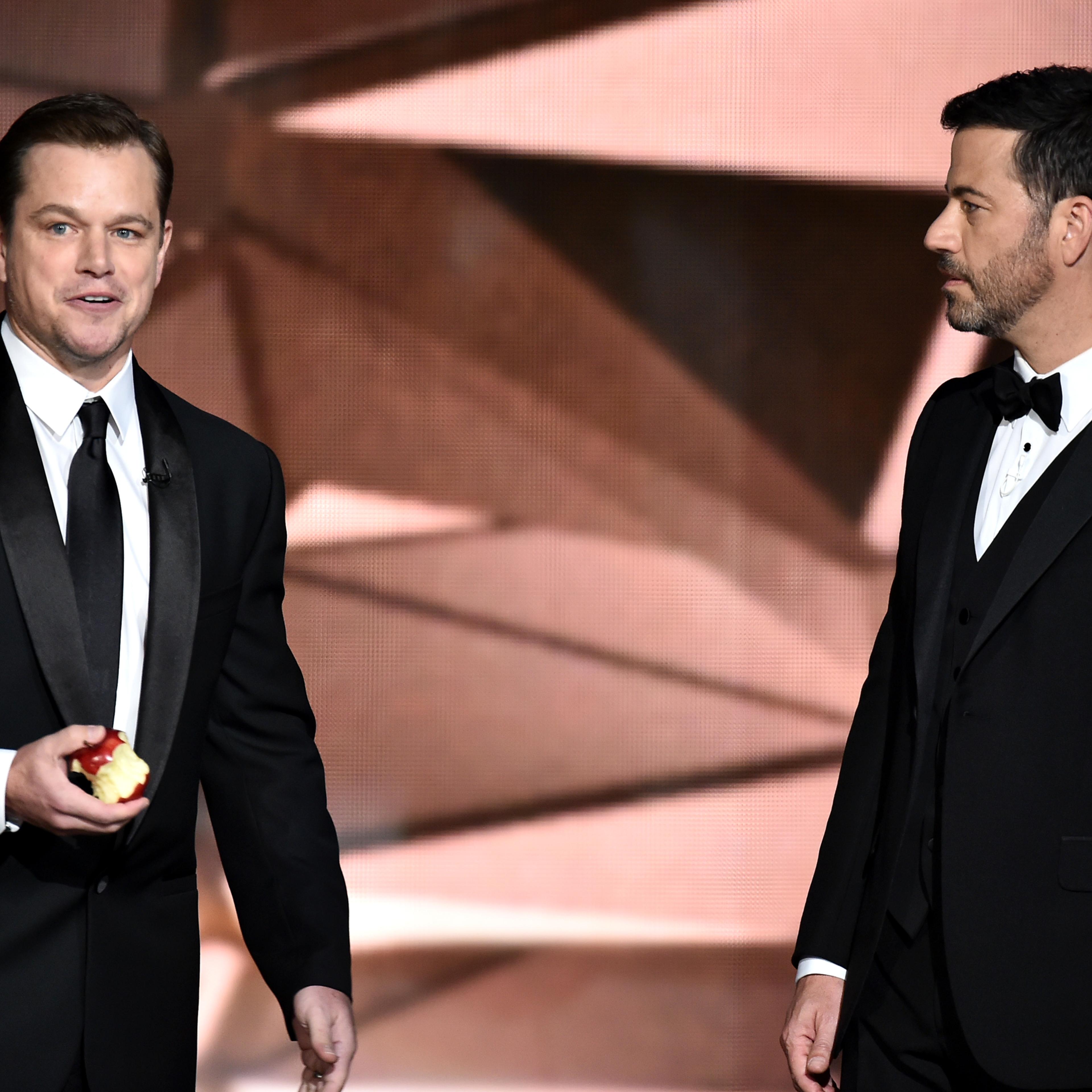 Matt Damon, left, and Jimmy Kimmel speak at the 68th Primetime Emmy Awards on Sept. 18, 2016 in Los Angeles.