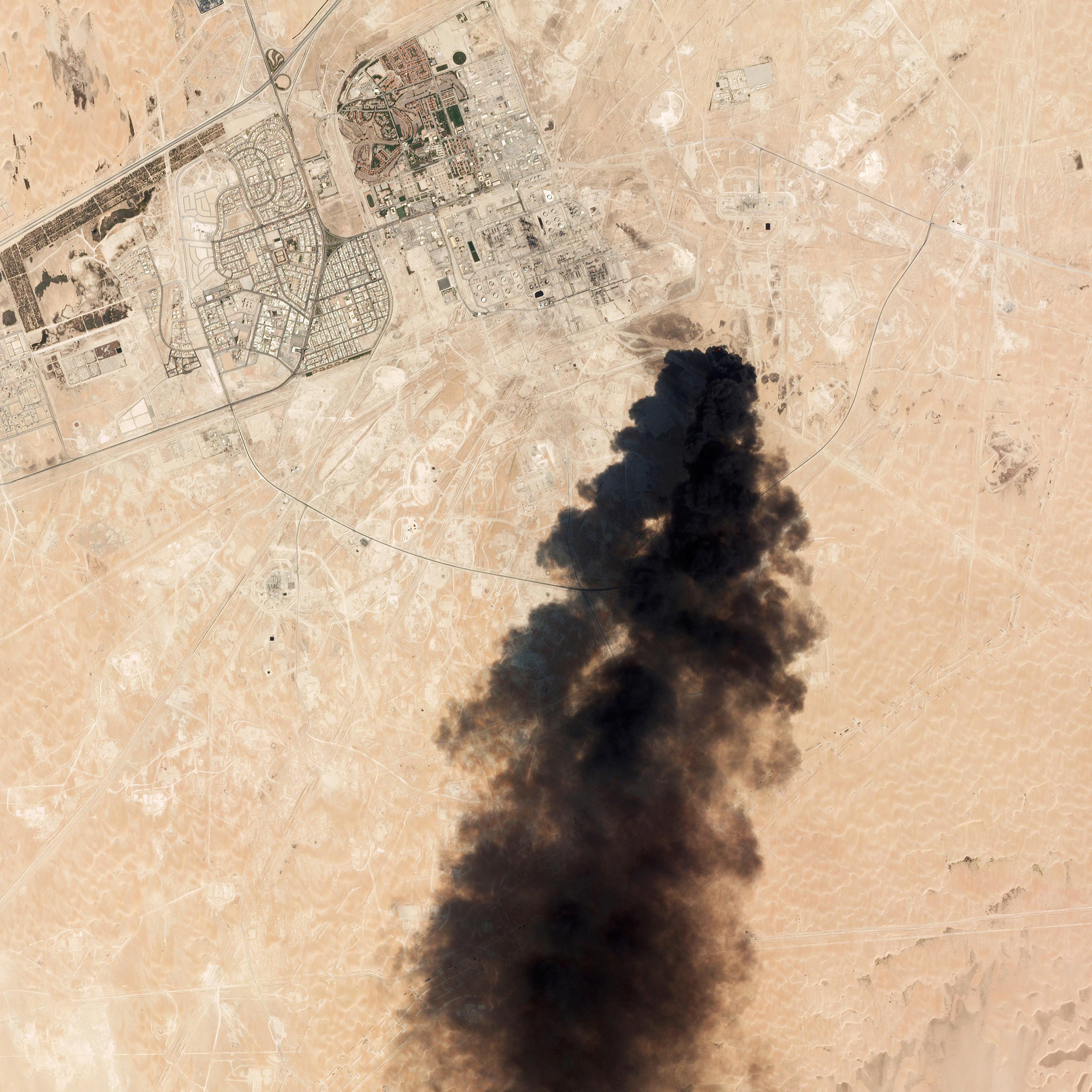 A satellite image shows smoke rising from an oil-processing plant in Buqyaq, Saudi Arabia, on Sept. 14