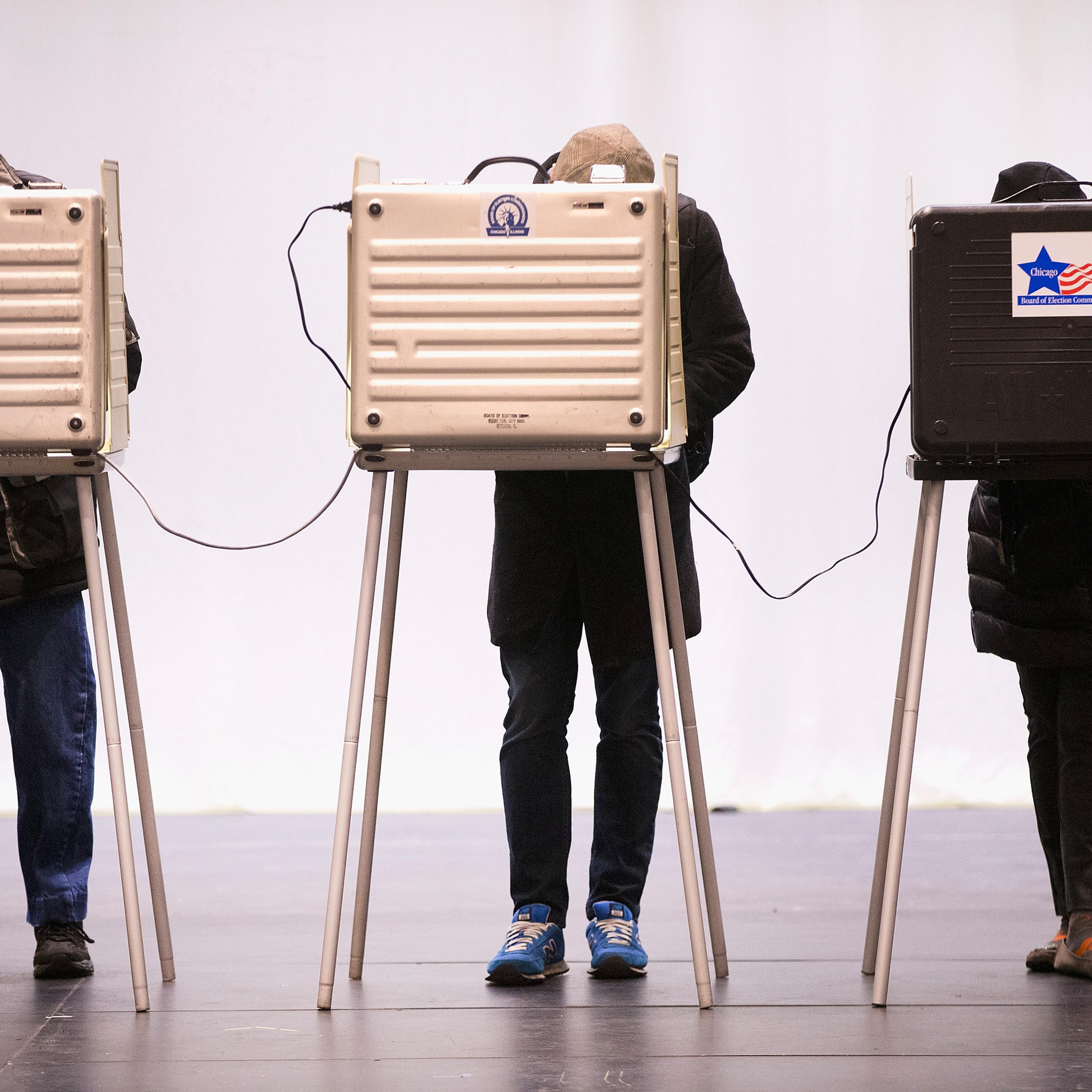 Voters casts their ballots at ChiArts High School on March 15, 2016 in Chicago.