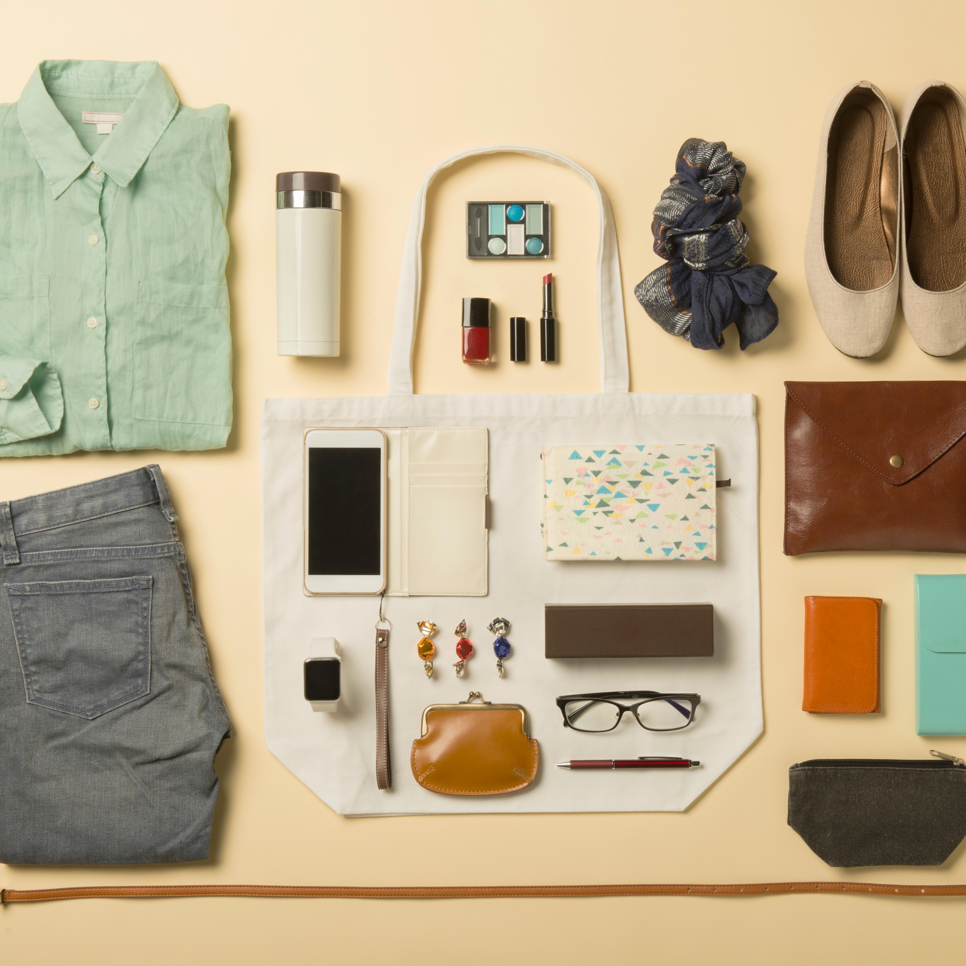 Woman daily supplies shot knolling style.