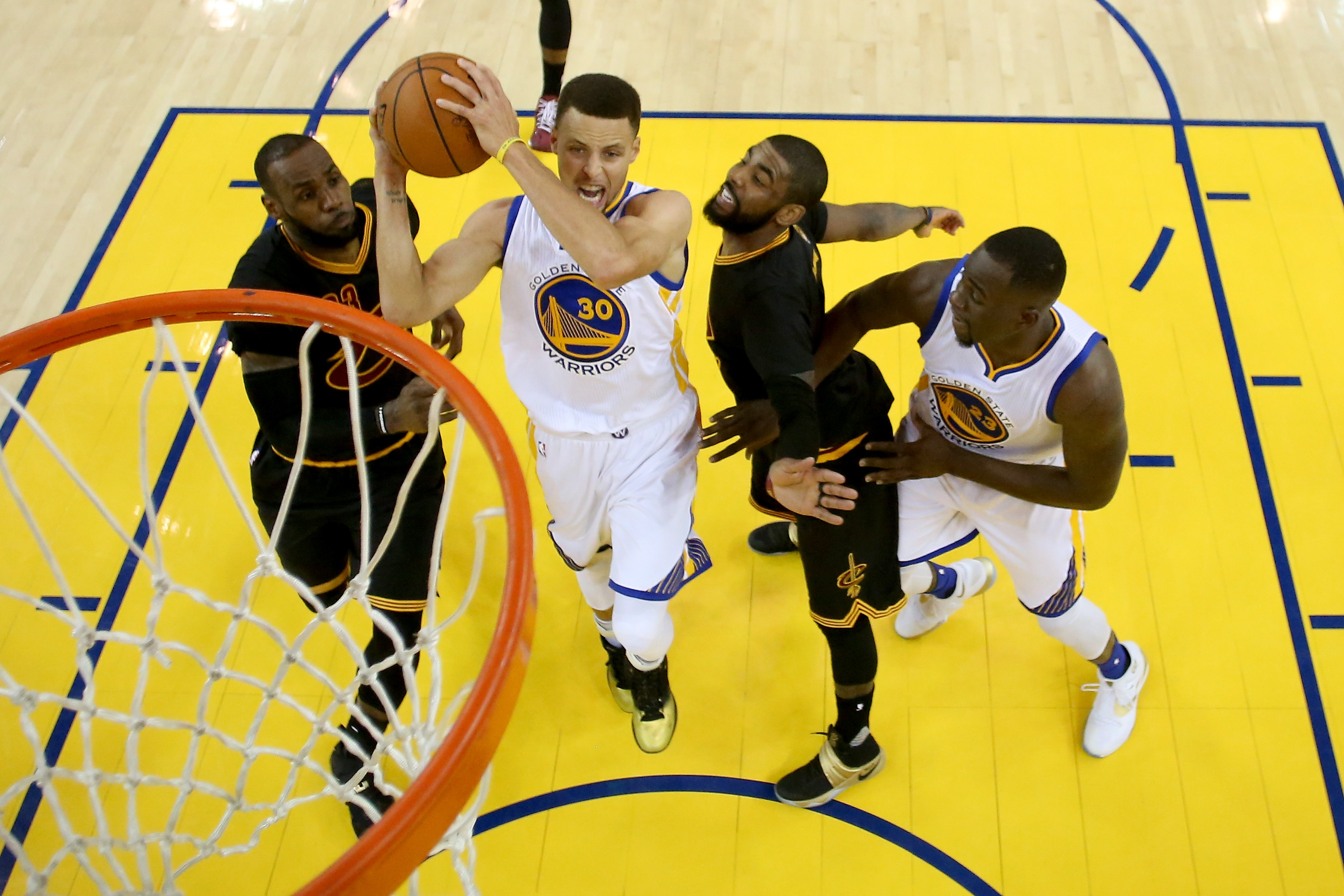 Stephen Curry #30 of the Golden State Warriors goes up for a shot against the Cleveland Cavaliers in Game 7 of the 2016 NBA Finals at ORACLE Arena on June 19, 2016 in Oakland, California.