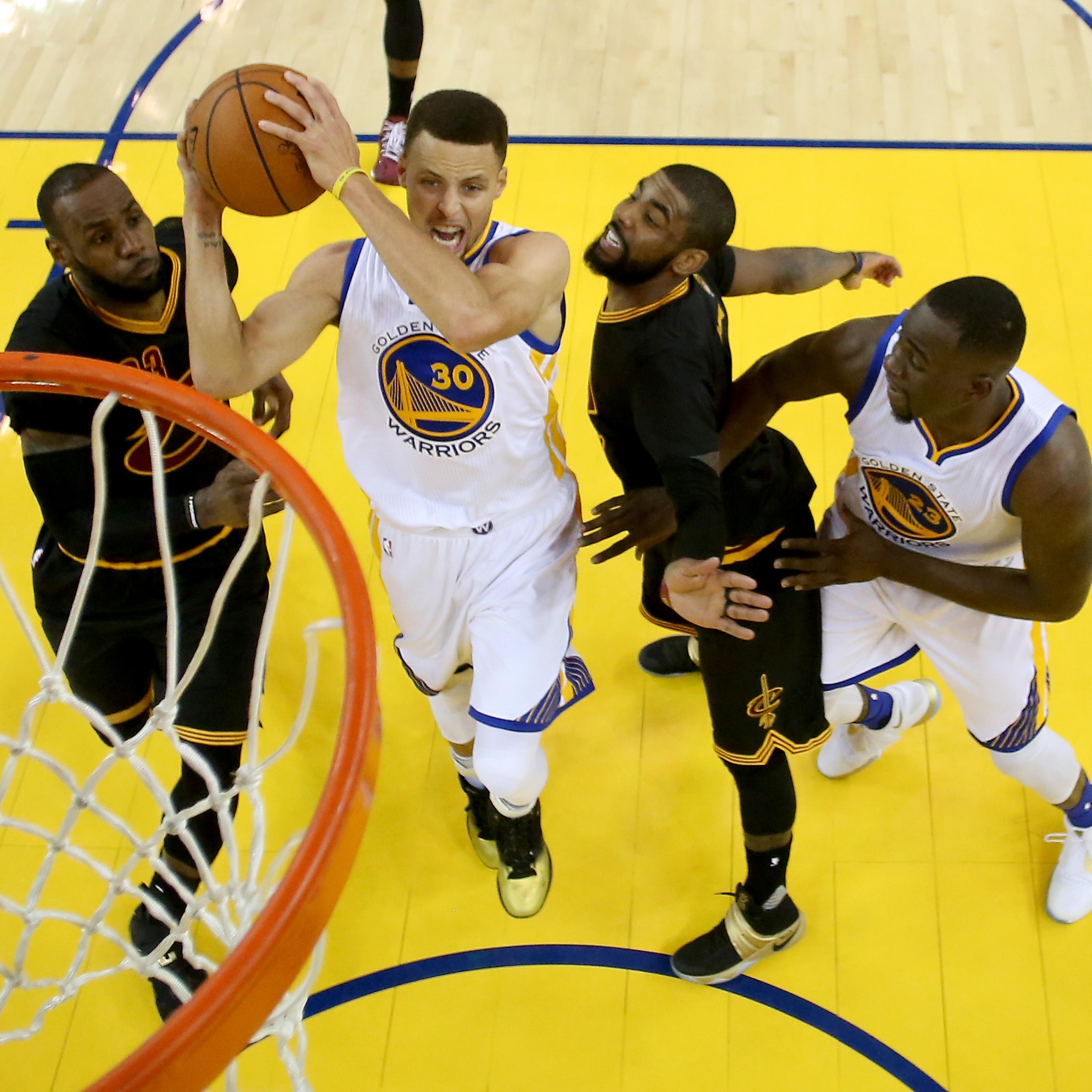 Stephen Curry #30 of the Golden State Warriors goes up for a shot against the Cleveland Cavaliers in Game 7 of the 2016 NBA Finals at ORACLE Arena on June 19, 2016 in Oakland, California.
