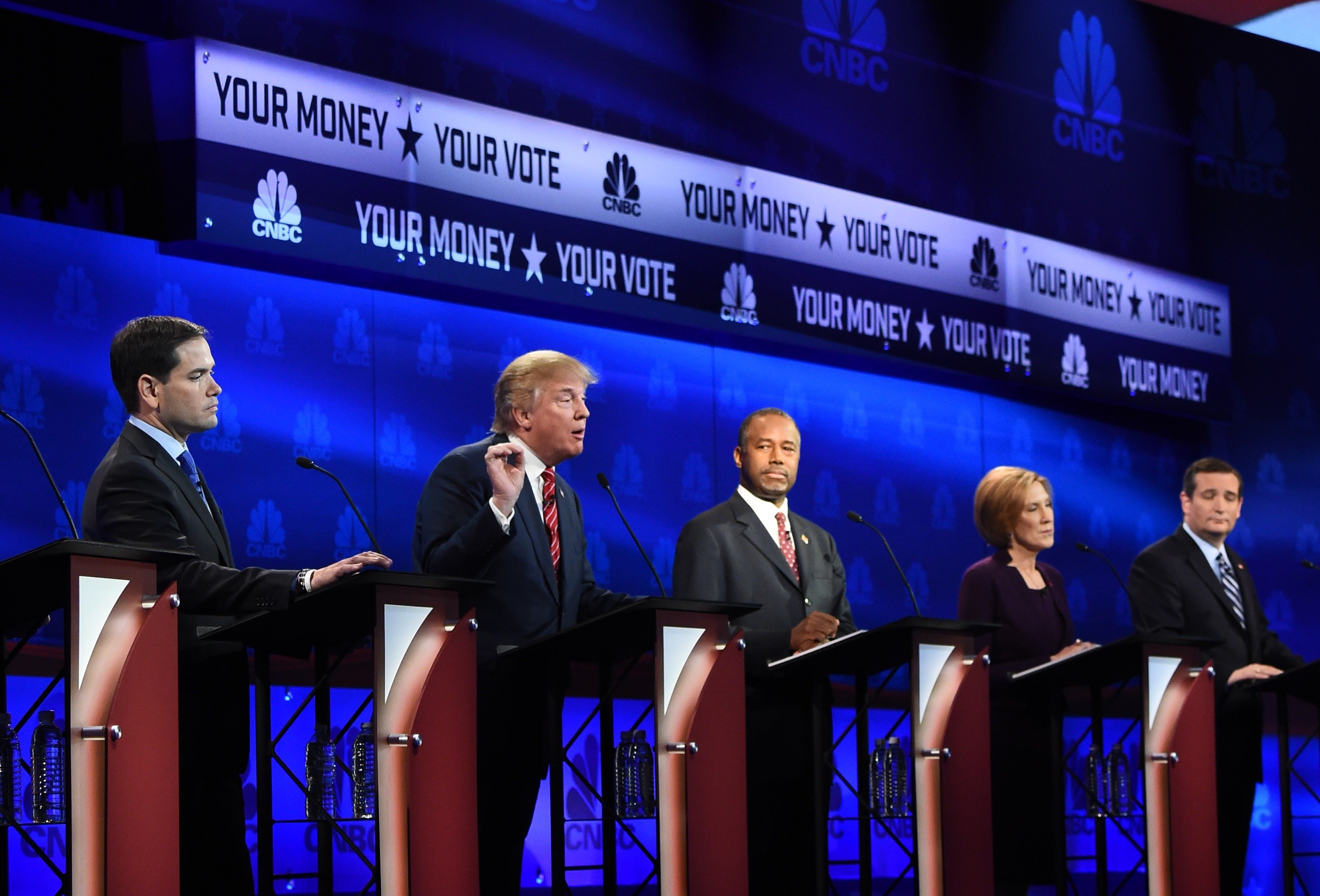 Republican Presidential hopeful Donald Trump (2L) speaks as Marco Rubio (L), Ben Carson (C), Carly Fiorina (2R), and Ted Cruz look on during the CNBC Republican Presidential Debate on Oct. 28, 2015 at the Coors Event Center at the University of Colorado 