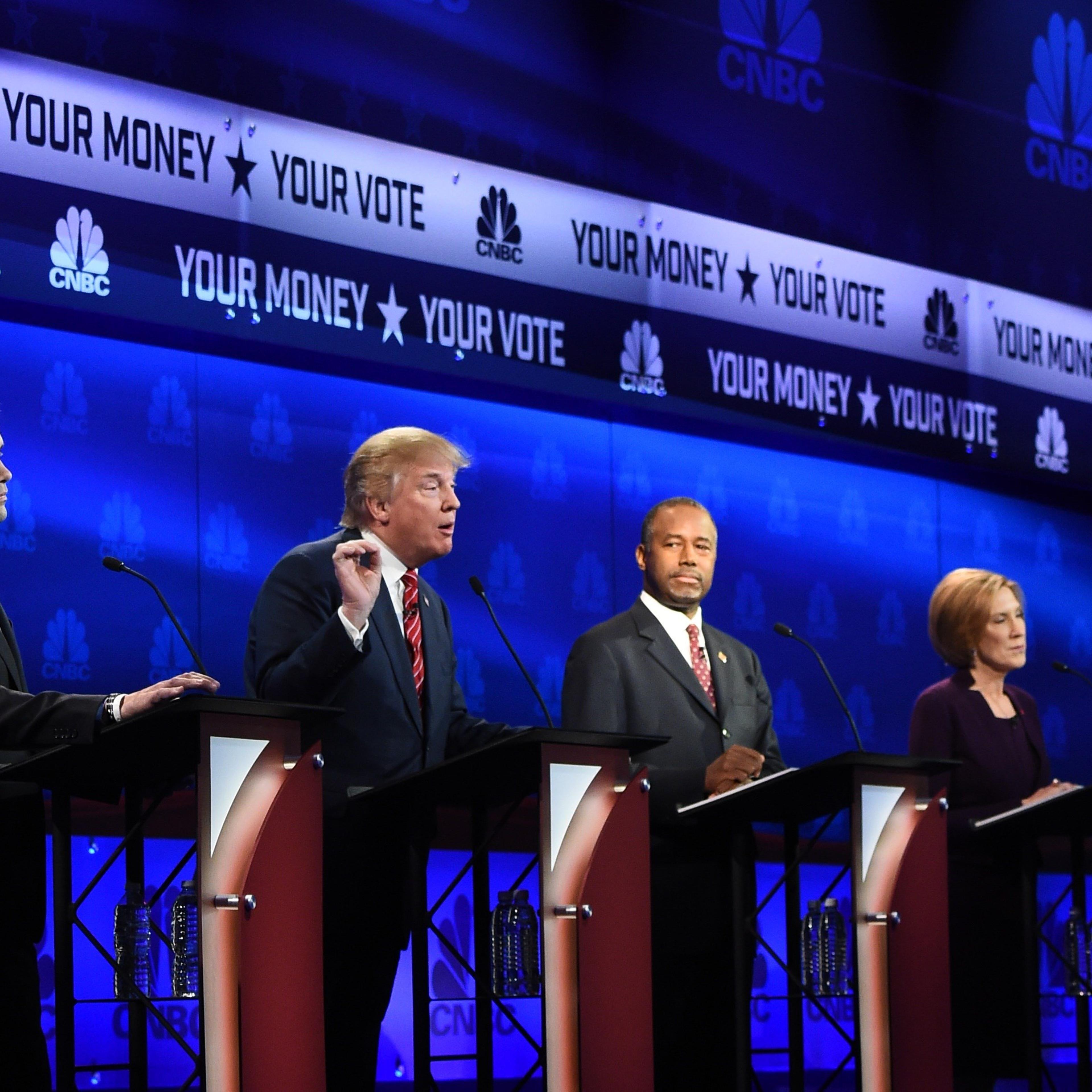 Republican Presidential hopeful Donald Trump (2L) speaks as Marco Rubio (L), Ben Carson (C), Carly Fiorina (2R), and Ted Cruz look on during the CNBC Republican Presidential Debate on Oct. 28, 2015 at the Coors Event Center at the University of Colorado