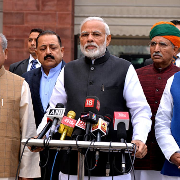 NEW DELHI, Dec. 12, 2018 -- Indian Prime Minister Narendra Modi front C speaks to media in New Delhi, India, Dec. 11, 2018. Indian Prime Minister Narendra Modi accepted his Bharatiya Janata Party's defeat in the just-concluded assembly elections in five