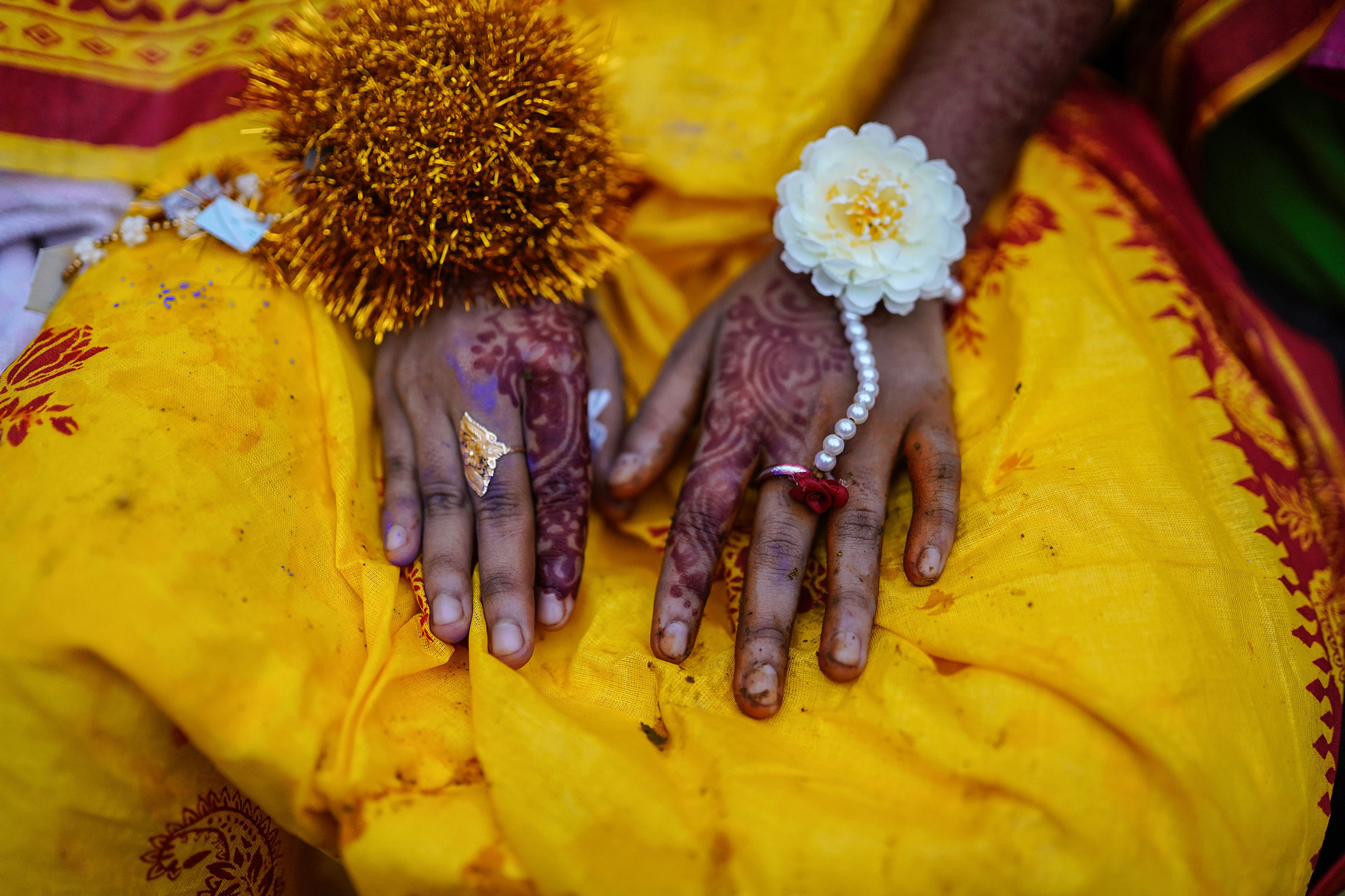 hands of a 14-year old girl on her wedding day in Bangladesh