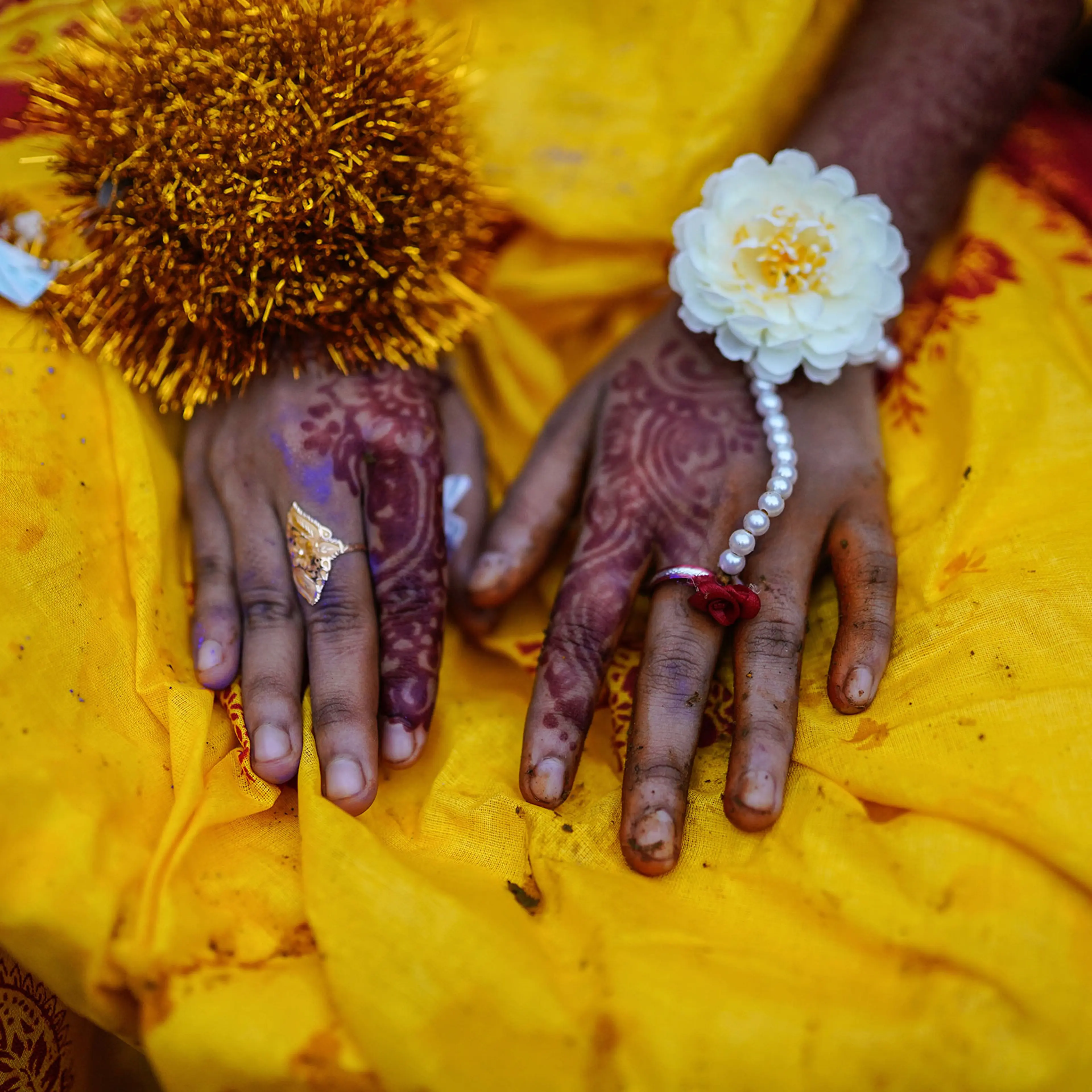 hands of a 14-year old girl on her wedding day in Bangladesh
