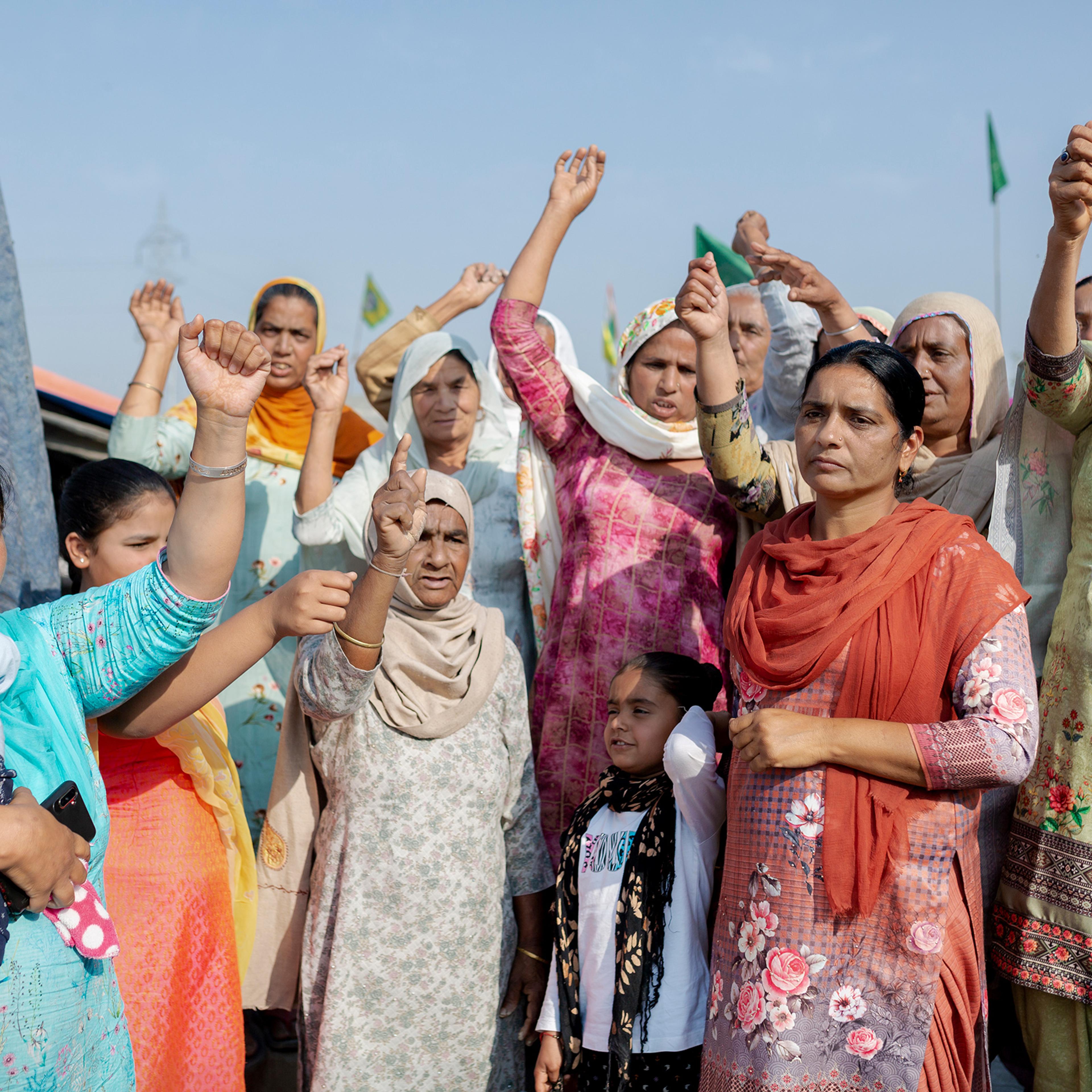 Kiranjit Kaur, far left, came to the Tikri protest site from Talwandi, Punjab, on Feb. 23 with a group of 20 women, including her mother-in-law and children. “It is important for all women to come here and mark their presence in this movement. I have two daughters, and I want them to grow up into the strong women they see here.”