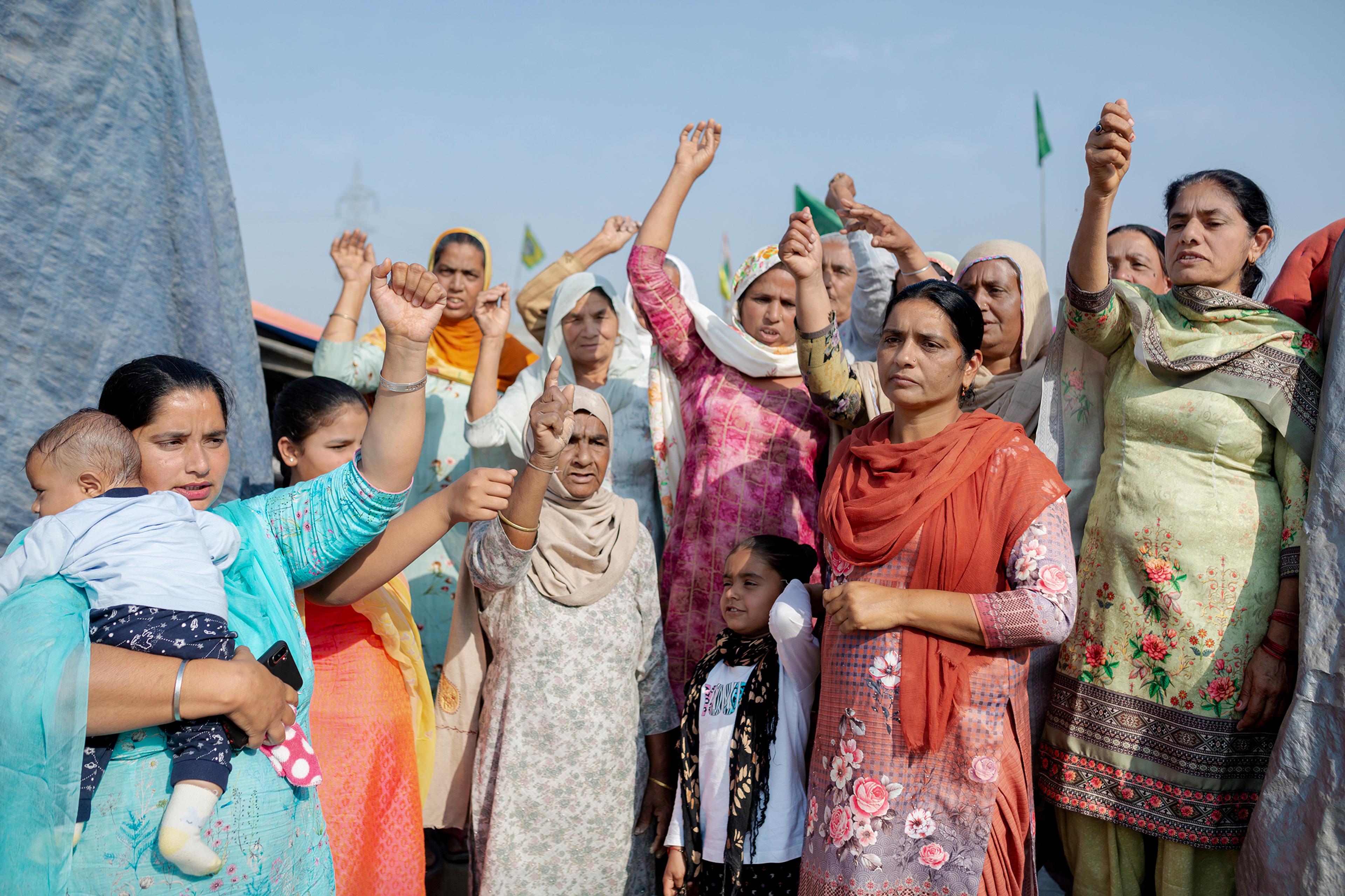 Kiranjit Kaur, far left, came to the Tikri protest site from Talwandi, Punjab, on Feb. 23 with a group of 20 women, including her mother-in-law and children. “It is important for all women to come here and mark their presence in this movement. I have two daughters, and I want them to grow up into the strong women they see here.”