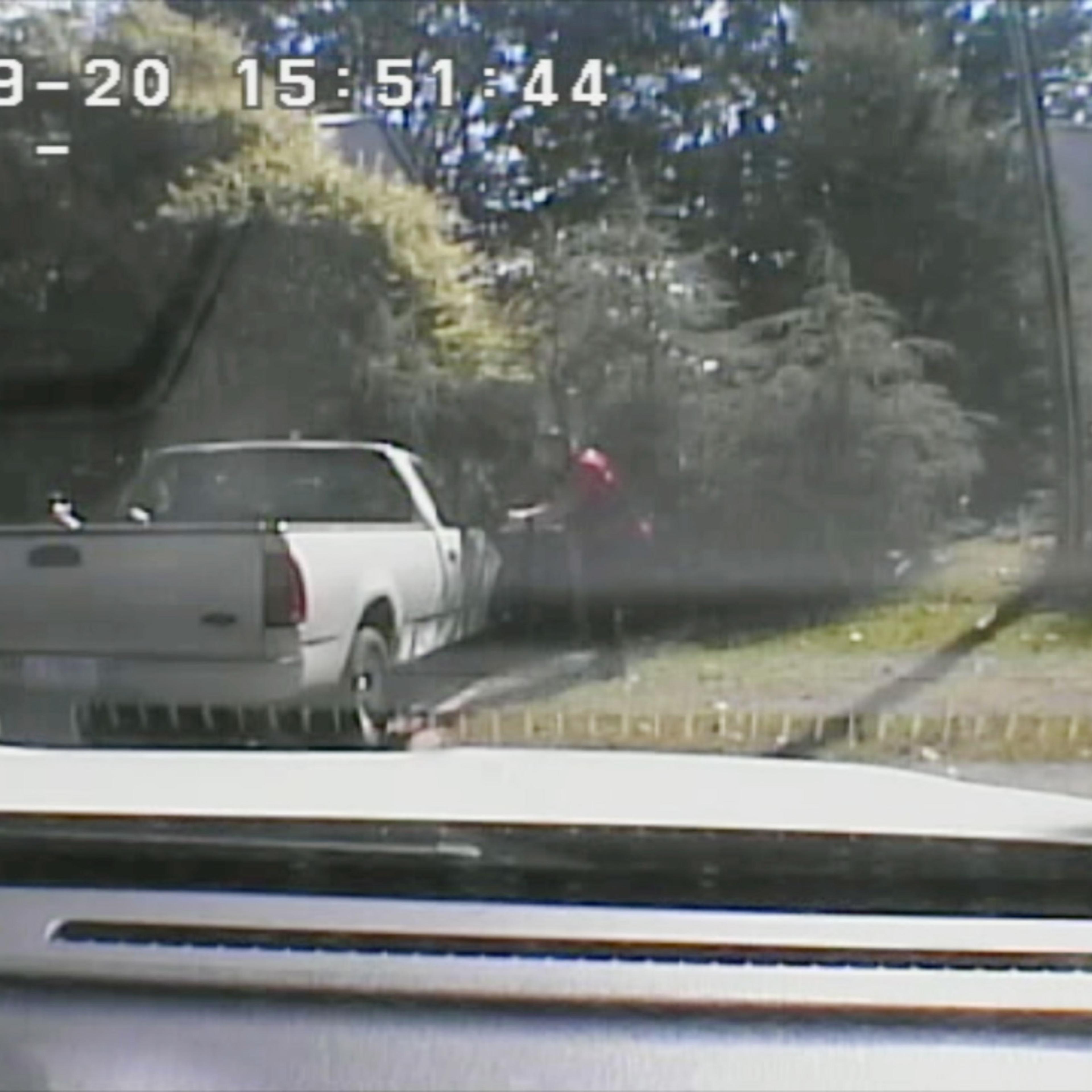 This image made from video provided by the Charlotte-Mecklenburg Police Department on Sept. 24, 2016 shows Keith Scott, left, moments before he was fatally shot by police in Charlotte, N.C., on Sept. 20, 2016.
