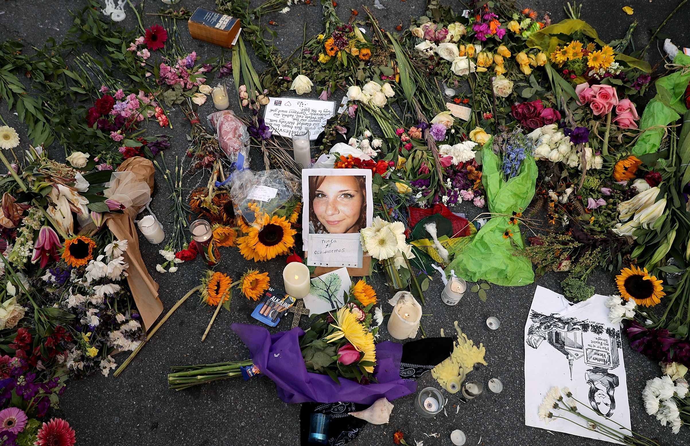 A makeshift memorial at the spot where Heather Heyer died in Charlottesville on Aug. 12