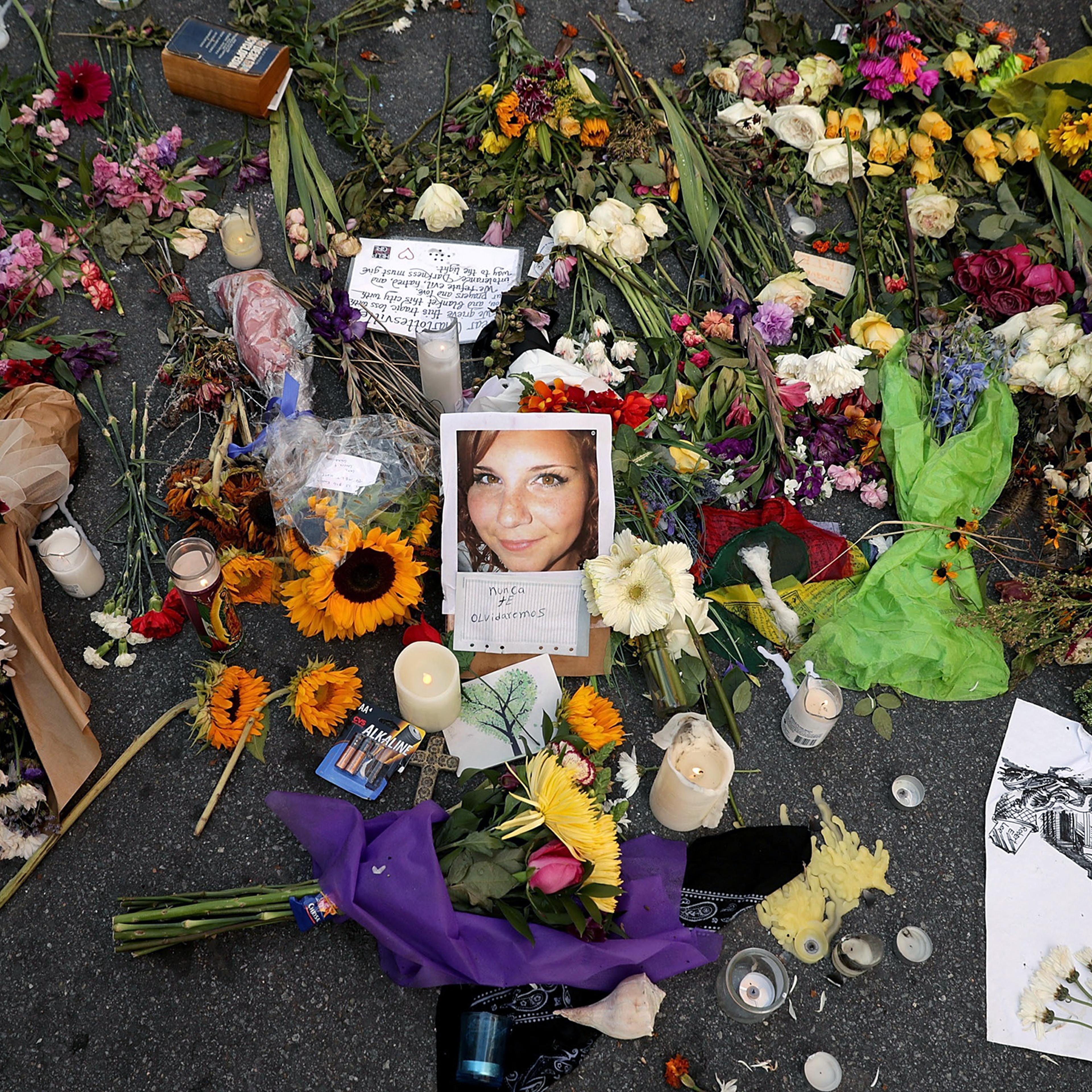 A makeshift memorial at the spot where Heather Heyer died in Charlottesville on Aug. 12