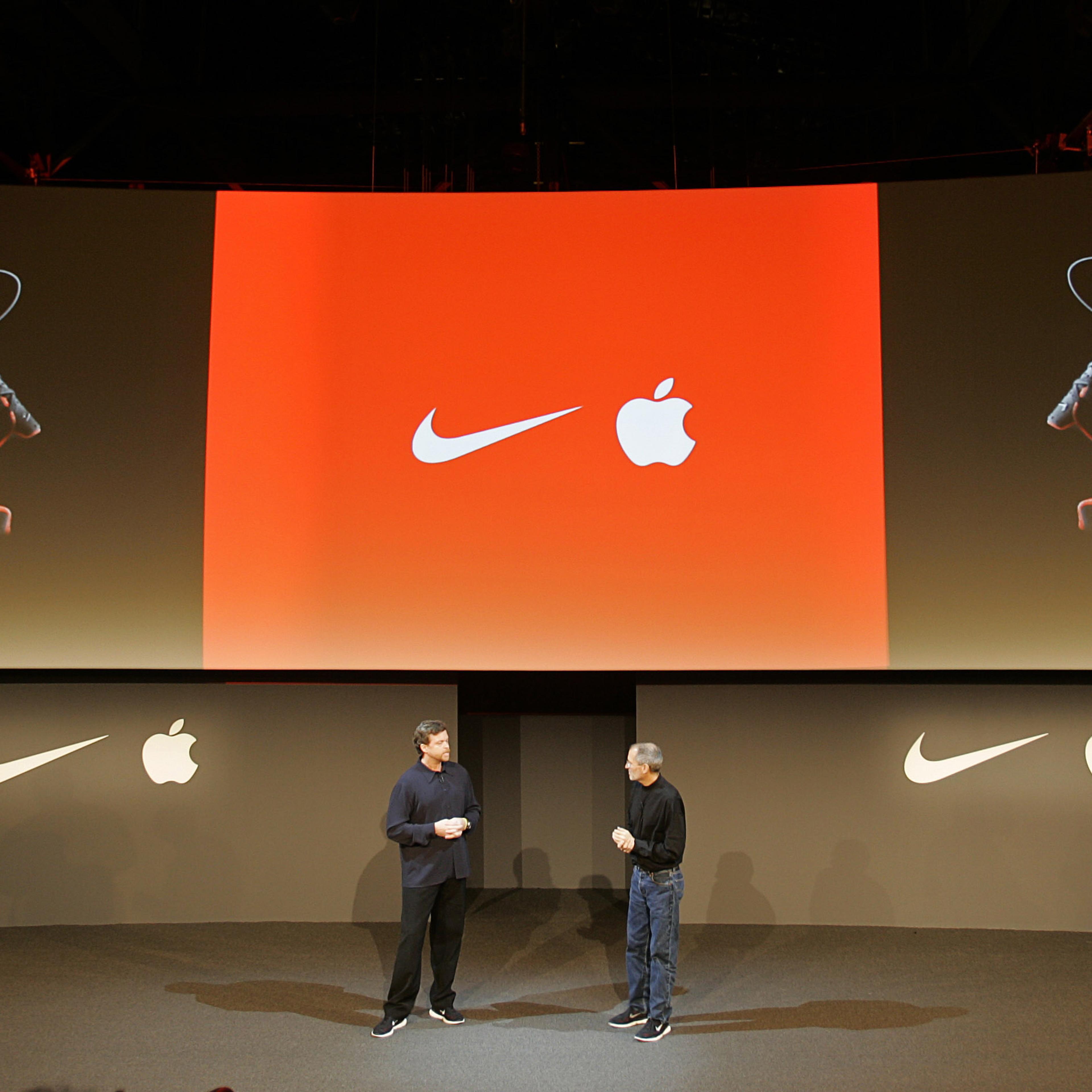 Nike CEO Mark Parker and Apple CEO Steve Jobs during the unveiling of a partnership between Nike and Apple announcing the Nike+iPod, which combines the Nike Air Zoom Moire and the Apple iPod to communicate with each other via the Nike+iPod kit, using a s