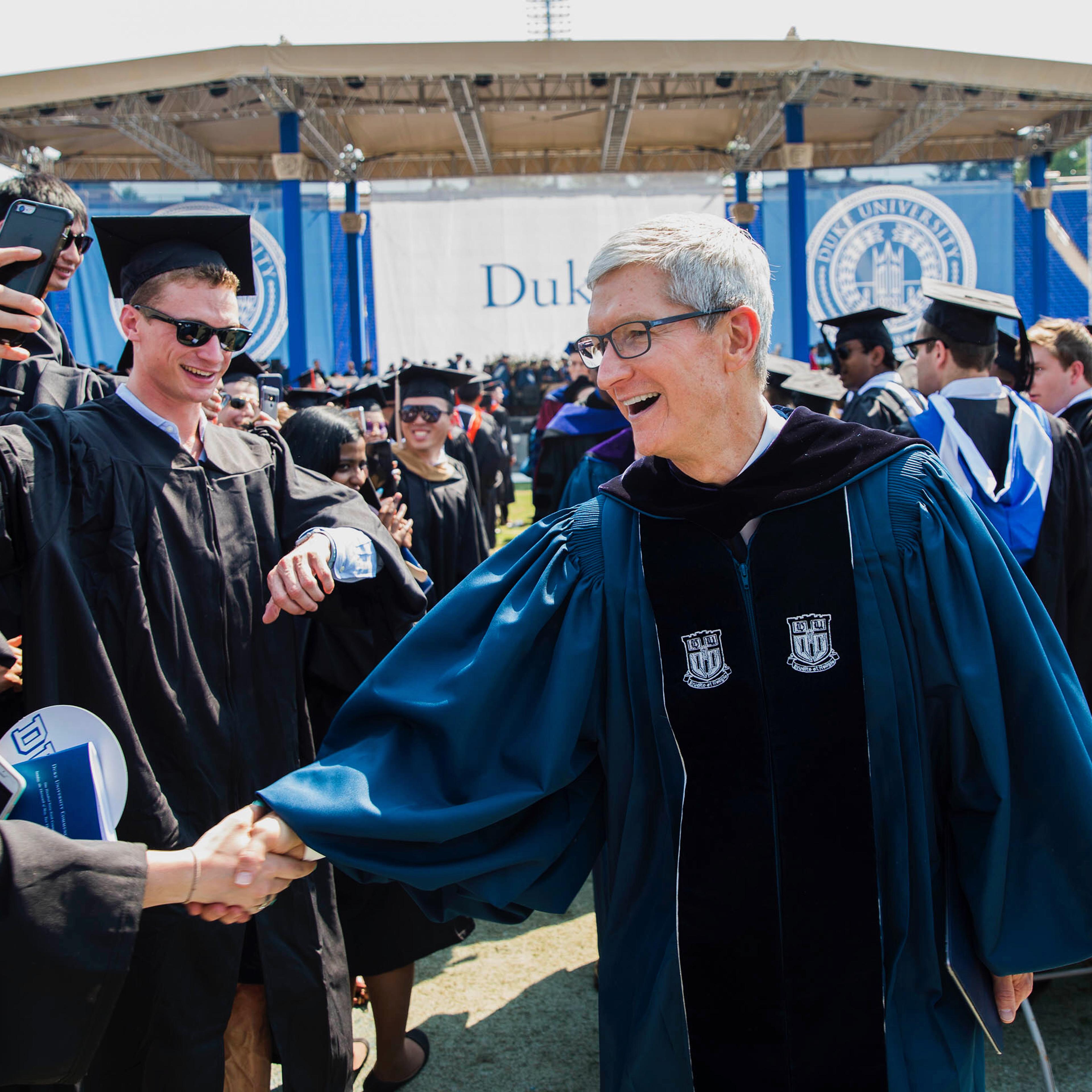 Tim Cook shaking hands with someone at Duke Commencement speech 2018