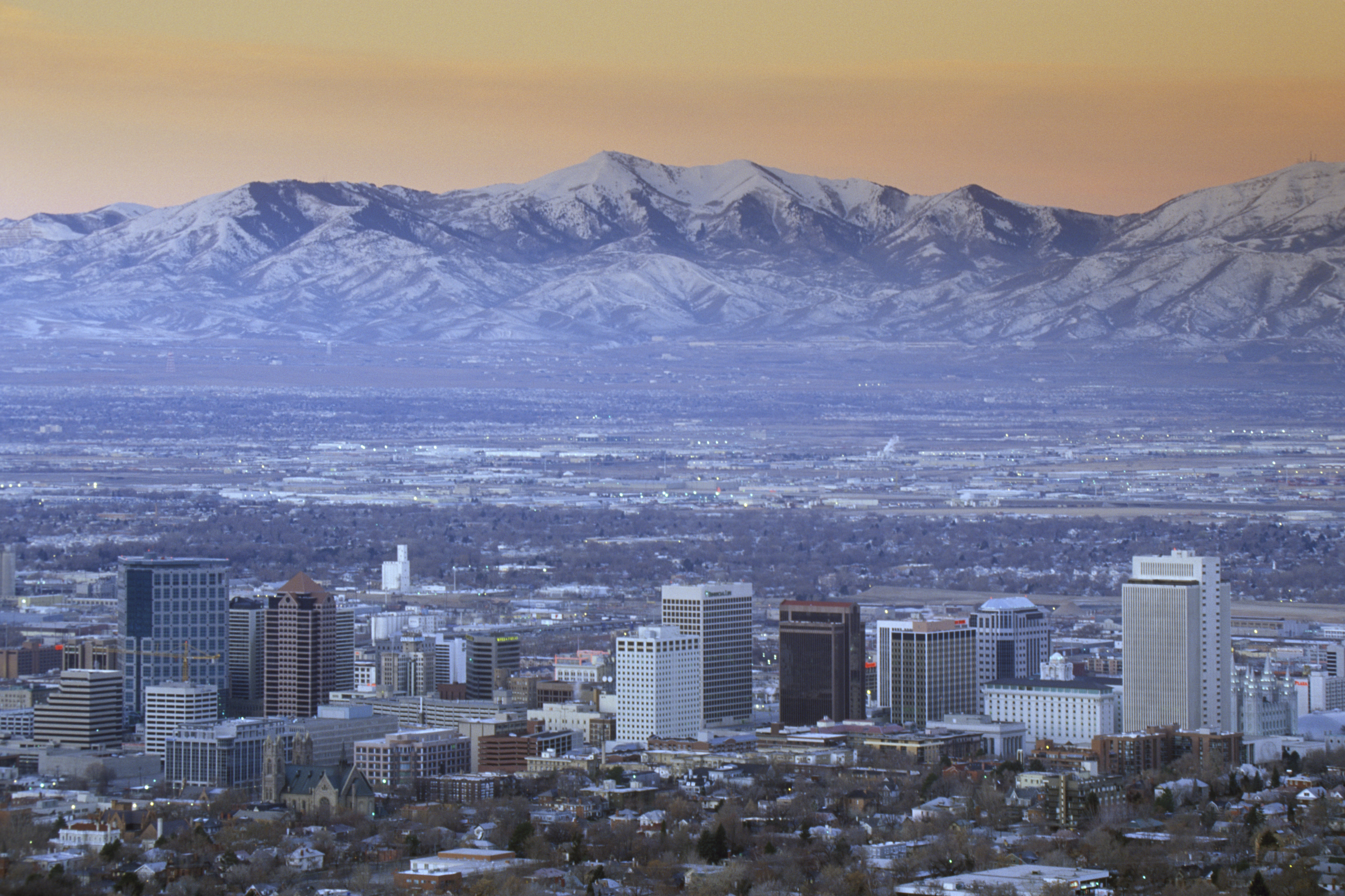 Skyline of Salt Lake City, UT with Snow capped Wasatch Mountains in background