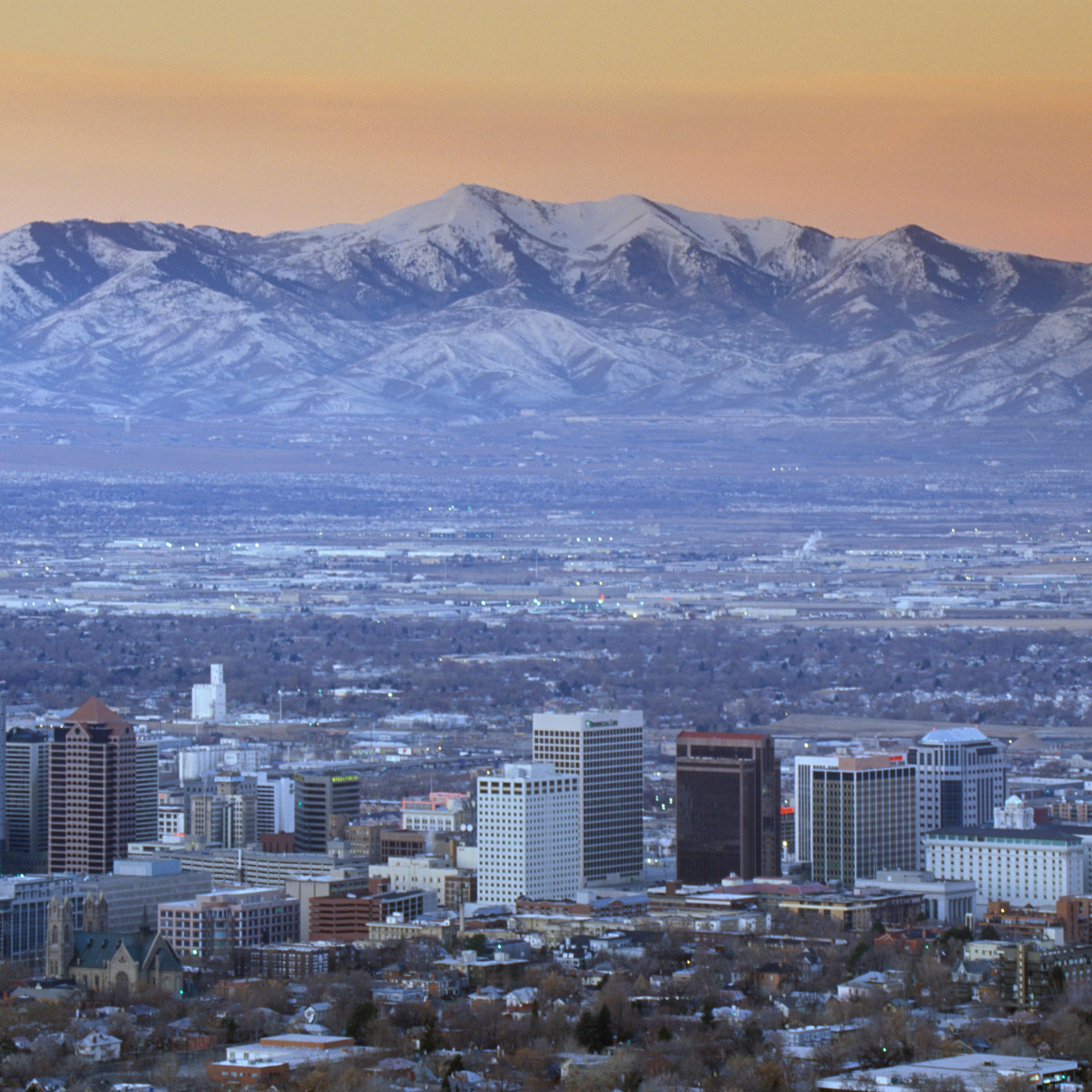 Skyline of Salt Lake City, UT with Snow capped Wasatch Mountains in background