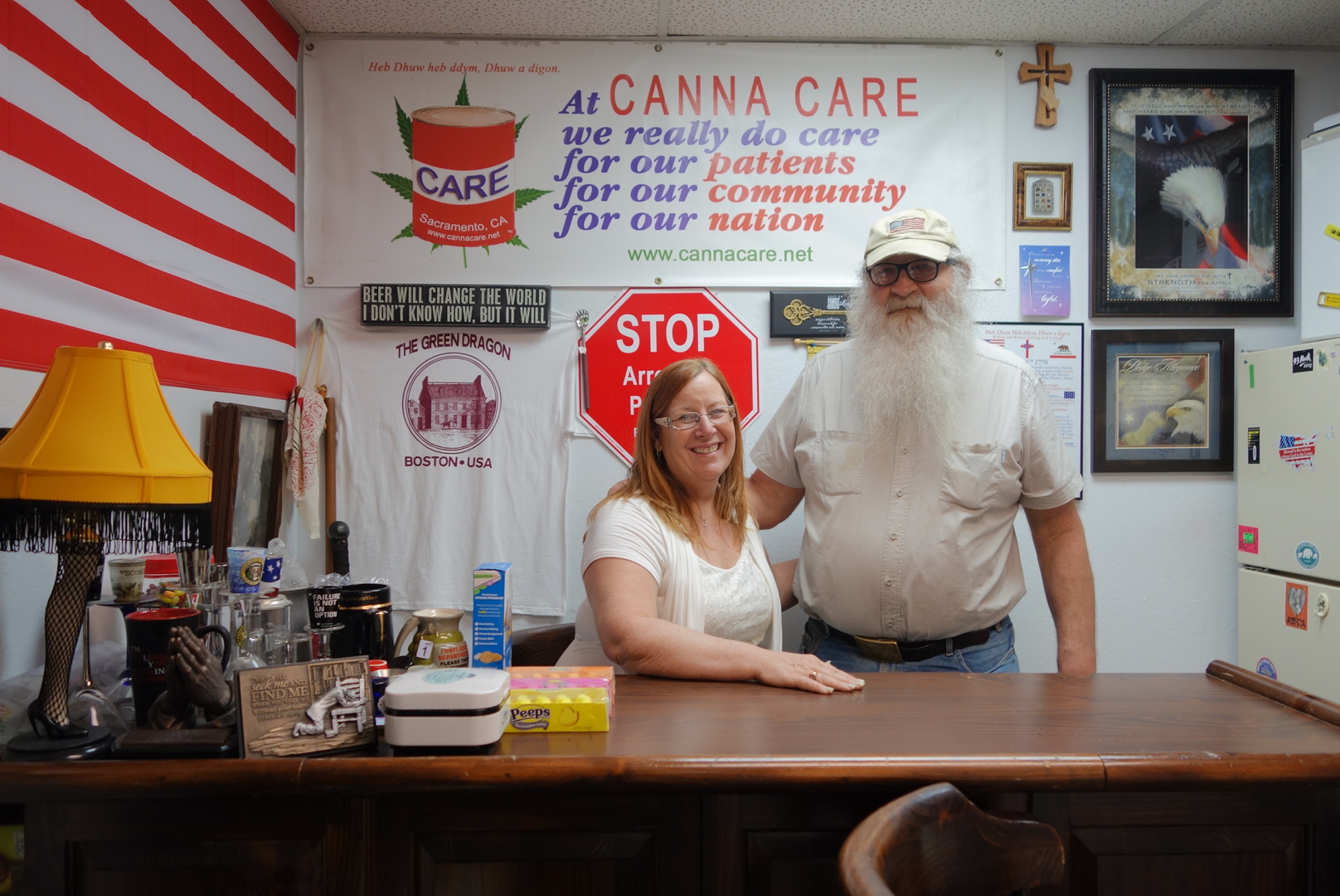 Bryan and Lanette Davies pose for a portrait at their  "Christian-based" medical marijuana dispensary in Sacramento in February 2014. 