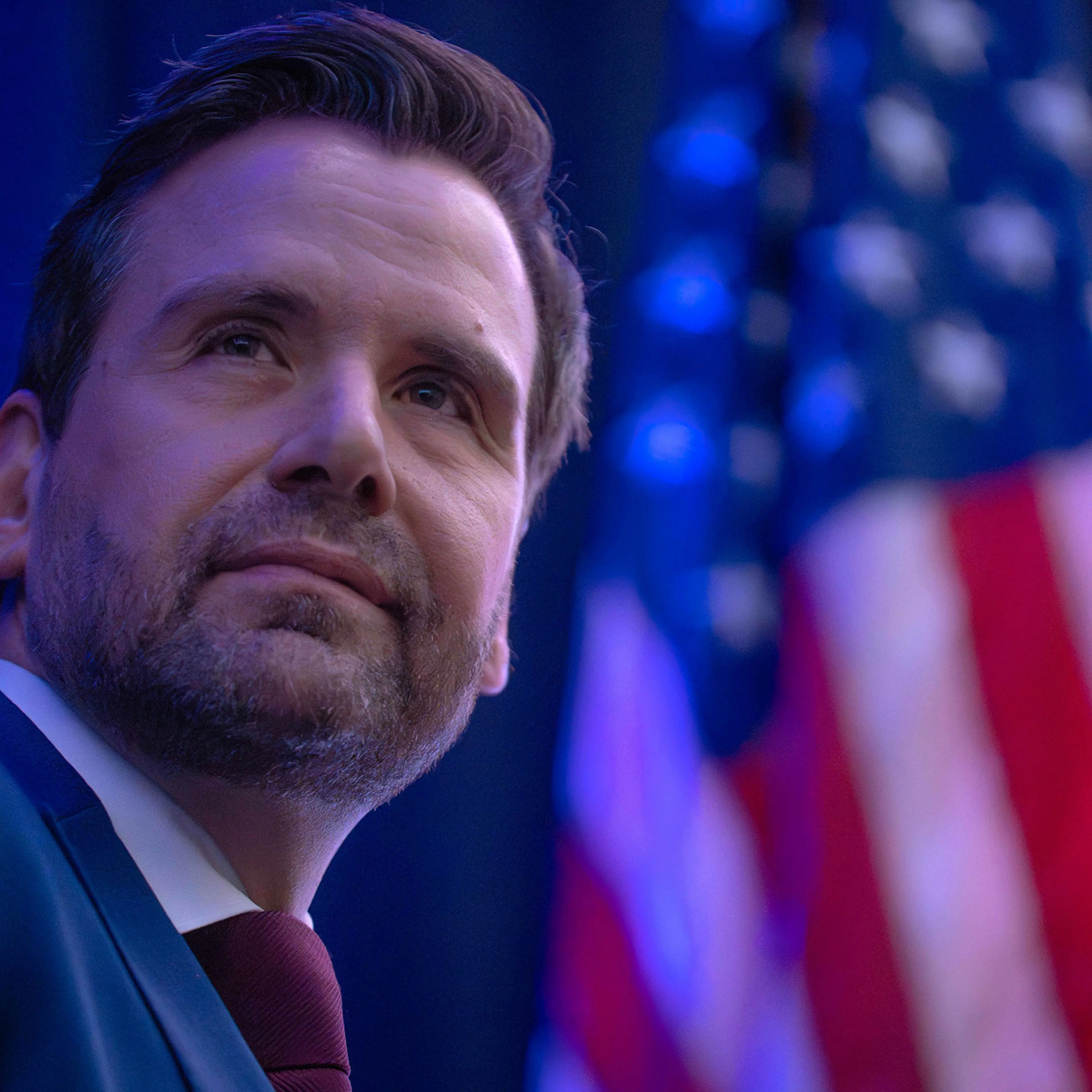 Josh Turek, Democratic candidate for U.S. Senate, looks over at supporters before he speaks during the Iowa Democratic Partyís