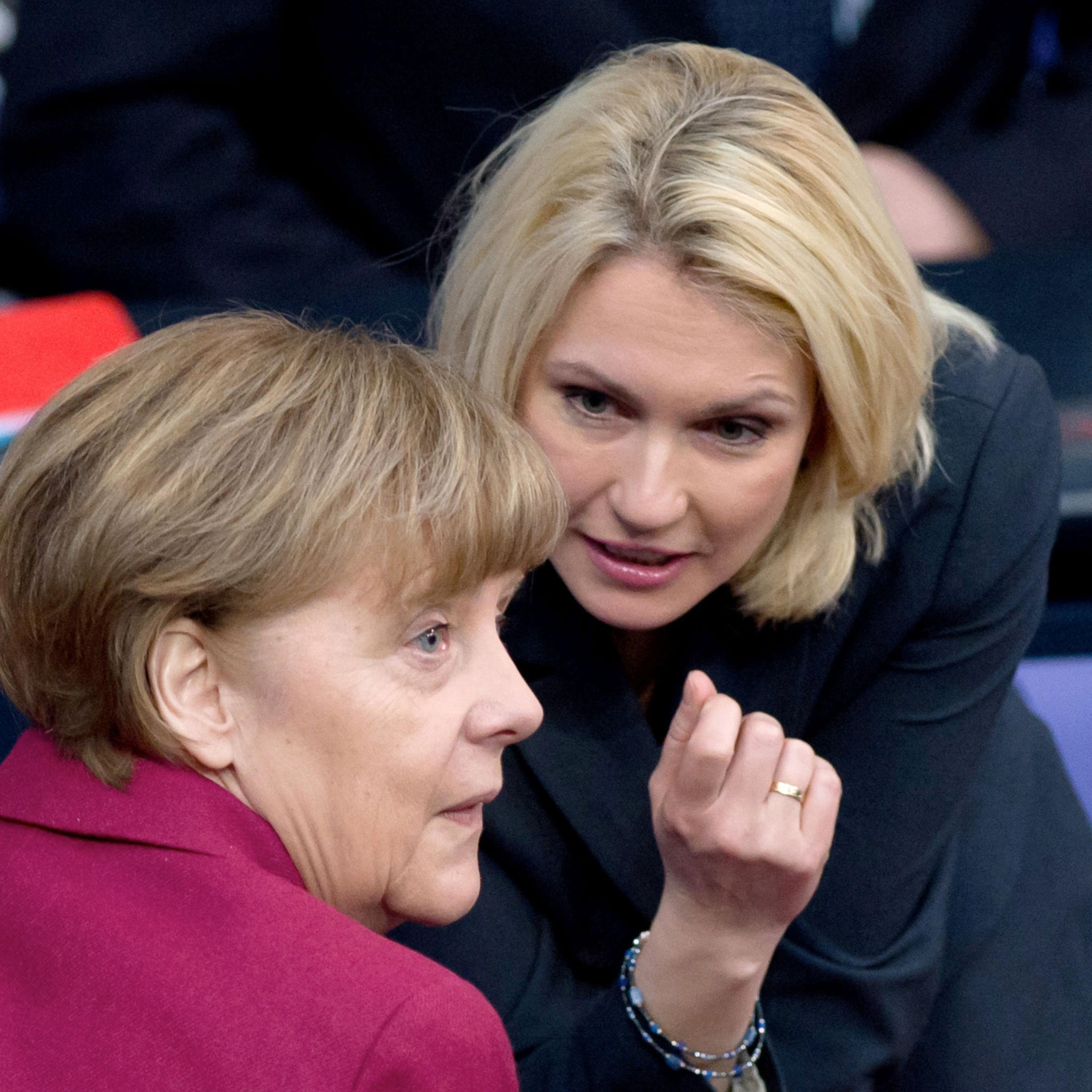 German chancellor Angela Merkel, left, and German Minister of Family Affairs Manuela Schwesig