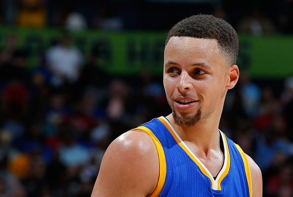 Stephen Curry #30 of the Golden State Warriors reacts during the game against the Atlanta Hawks at Philips Arena on February 22, 2016 in Atlanta, Georgia.