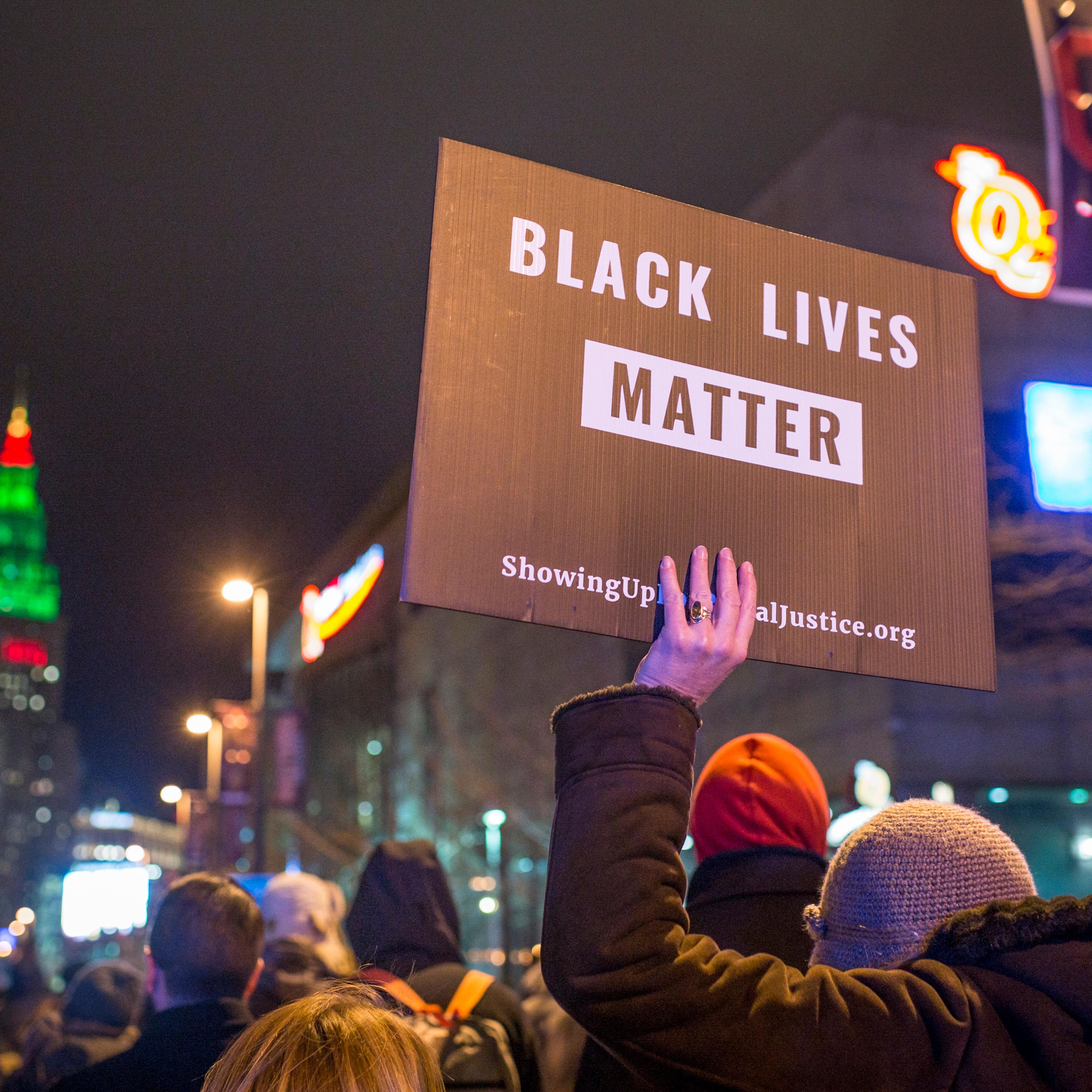 Demonstrators march on Ontario St. in Cleveland, Ohio, on Dec. 29, 2015