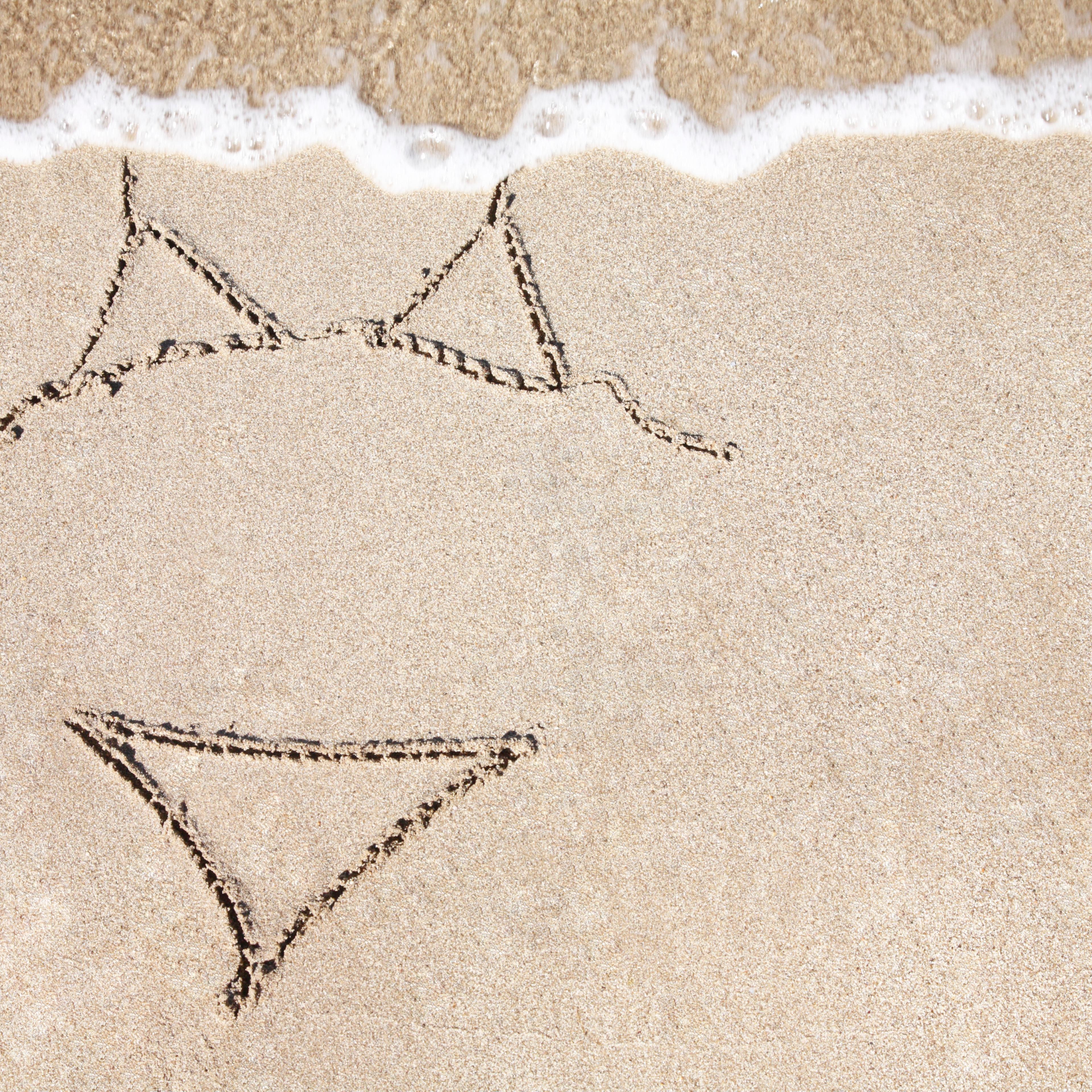Illustration of a Bikini on sandy beach