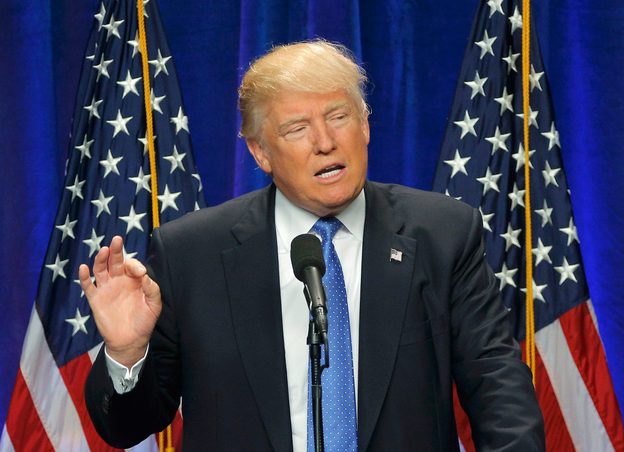 Republican U.S. presidential candidate Donald Trump delivers a speech at St. Anselm's College in Manchester, New Hampshire, U.S., June 13, 2016. REUTERS/Brian Snyder