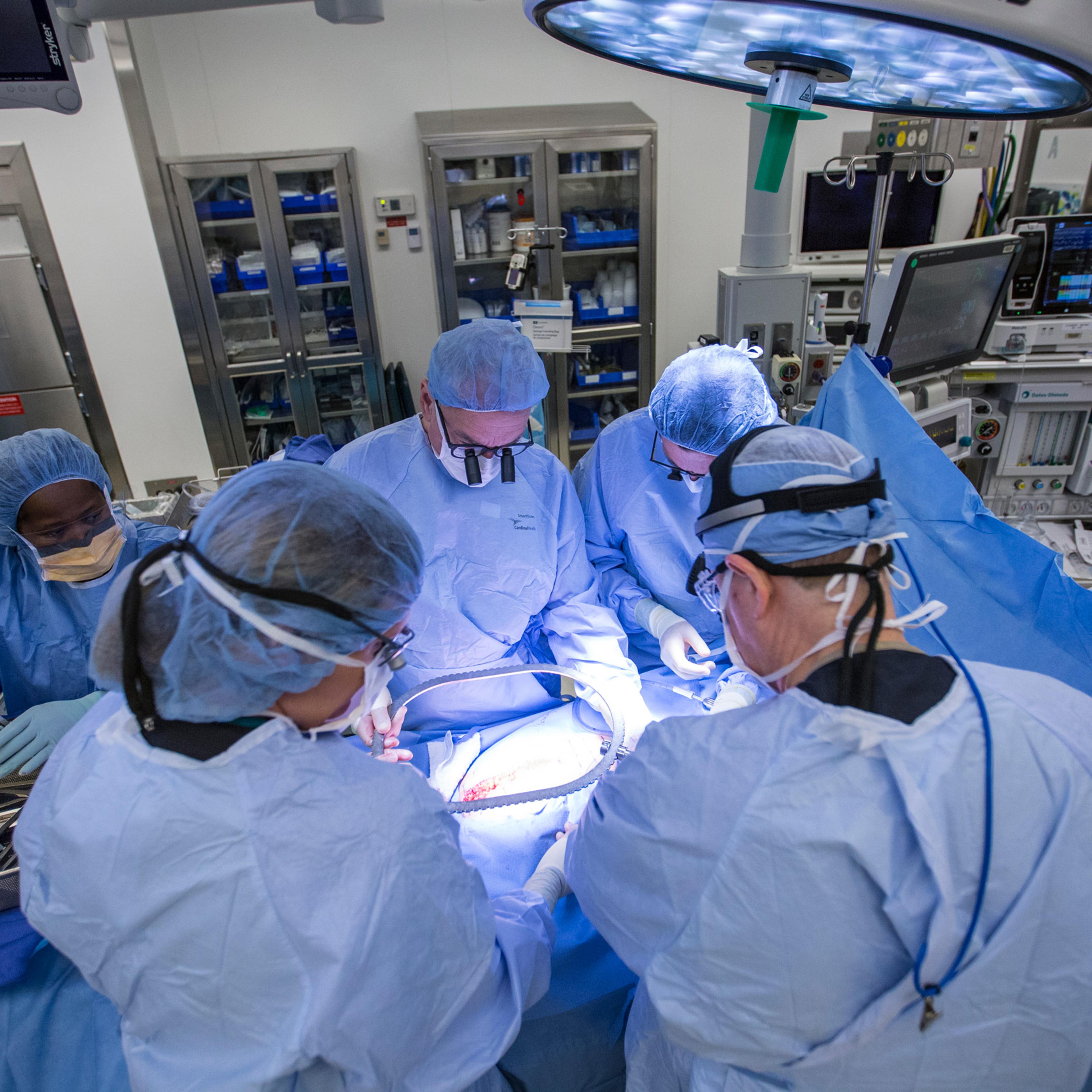From left to right: Dr. Greg McKenna, Dr. Giuliano Testa, Dr. E. Colin Koon, and Dr. Liza Johannesson perform a womb transplant surgery at Baylor University Medical Center on Sept. 14, 2016.