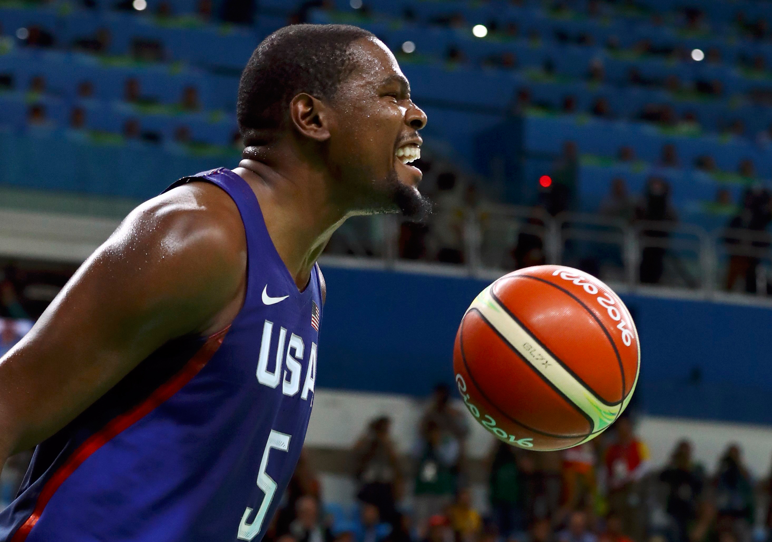 2016 Rio Olympics - Basketball - Final - Men's Gold Medal Game Serbia v USA - Carioca Arena 1 - Rio de Janeiro, Brazil - 21/8/2016. Kevin Durant (USA) of the USA reacts after a dunk. REUTERS/Jim Young FOR EDITORIAL USE ONLY. NOT FOR SALE FOR MARKETING OR